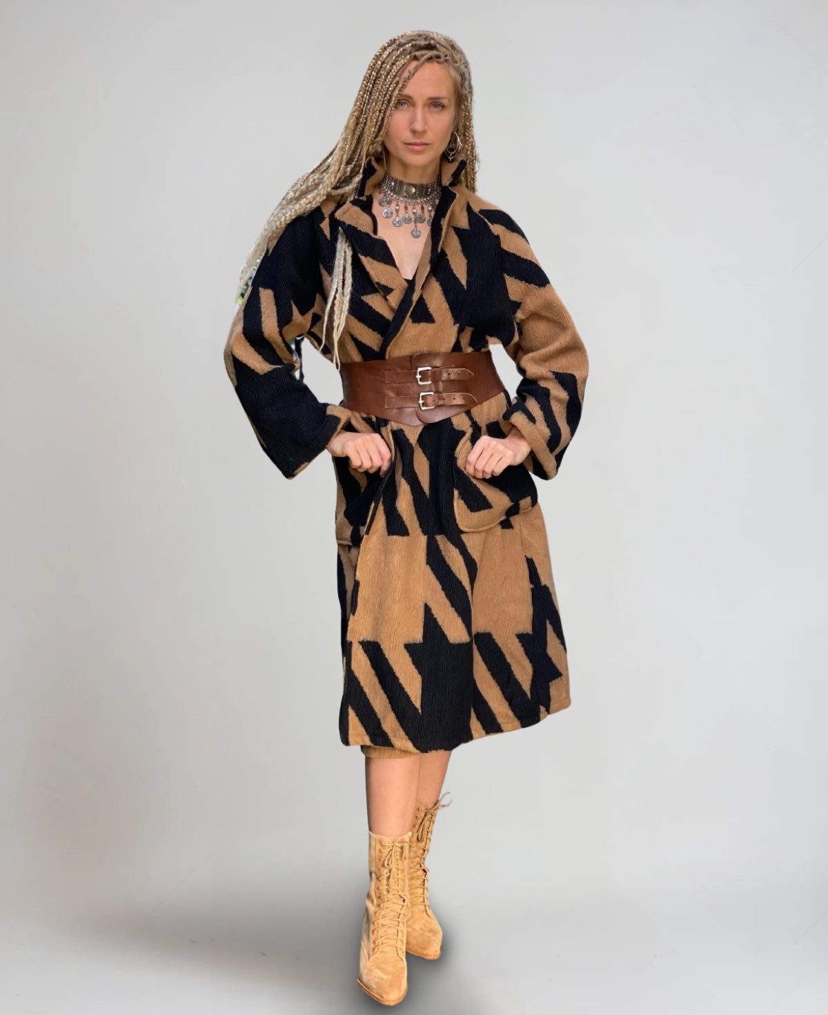 Camel Cabana Wool Blend Coat with black stripes, oversized pockets, and a flattering belted waist for a modern silhouette.