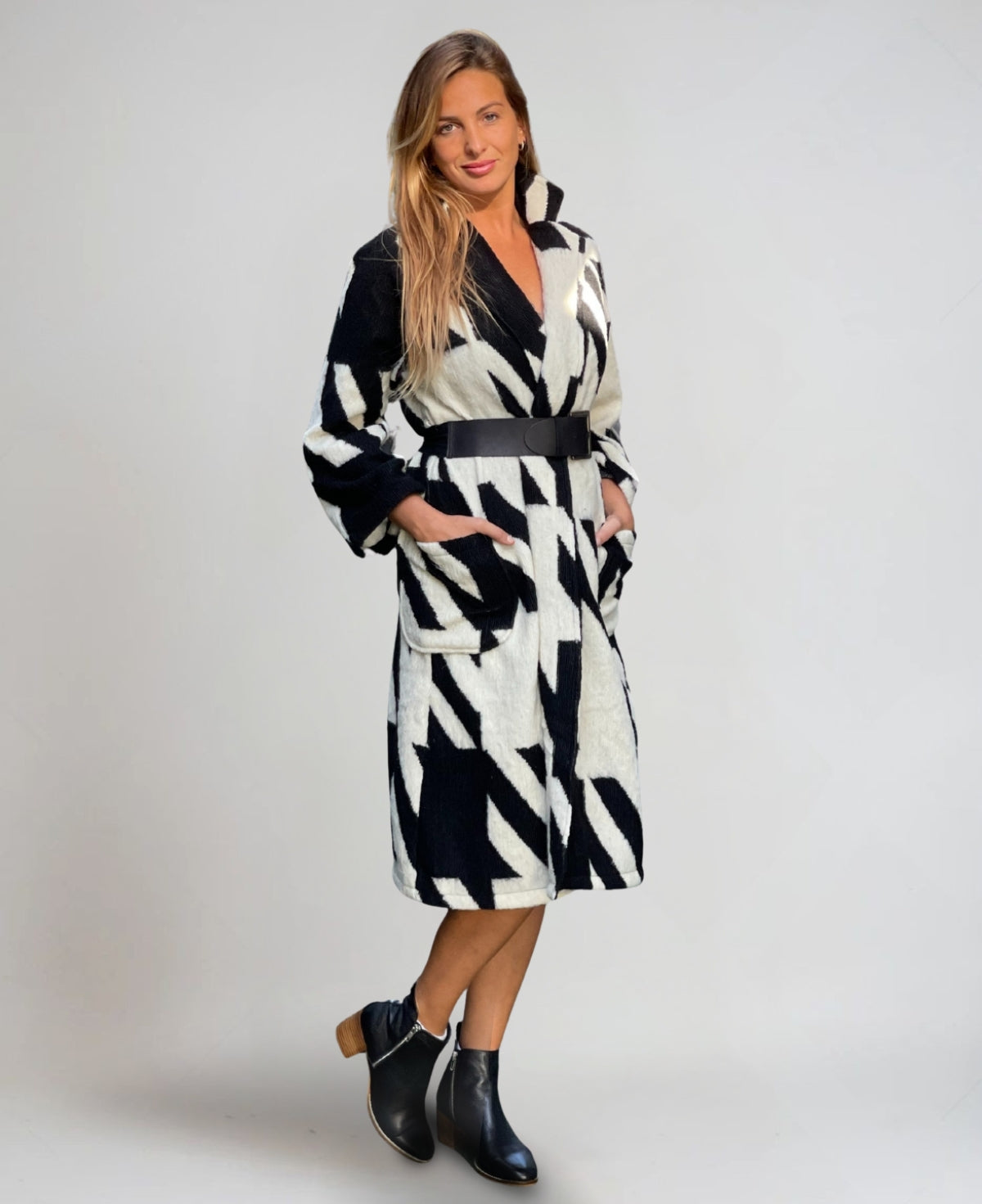 White Cabana Wool Blend Coat with bold black stripes, belted waist, and cozy front pockets for a chic winter look.