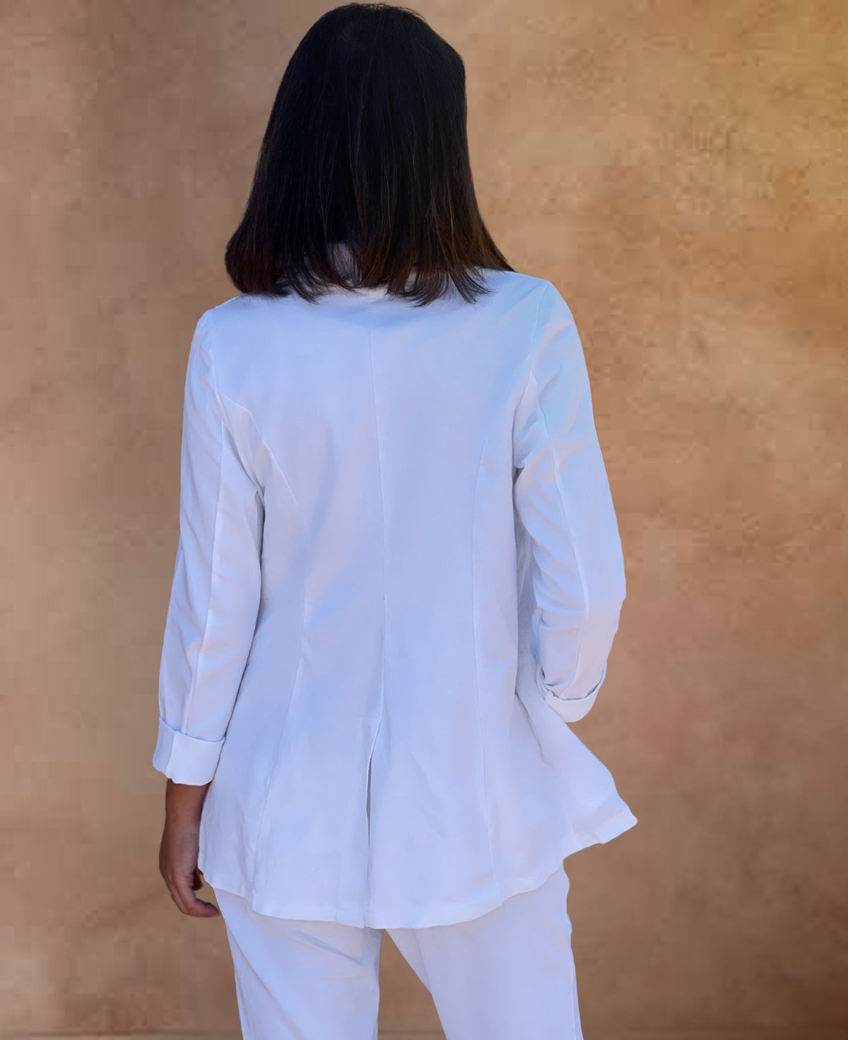 Back view of the Florence Blazer in White from the Florence Collection by Jenny Jazz Designs – an unlined, premium linen blazer showcasing the soft cotton jersey details, designed for versatile, elegant Italian fashion.