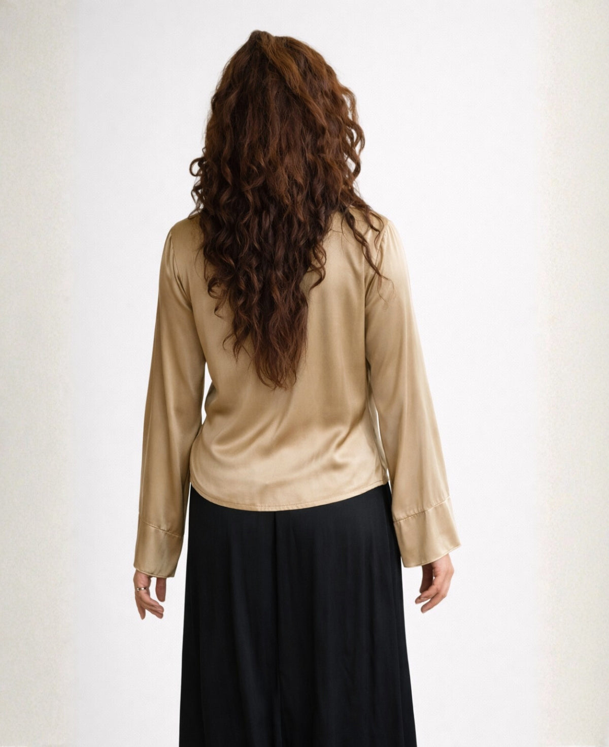 Back view of the Gold Coral cross-over satin blouse showing the clean back panel and fluid satin fabric.