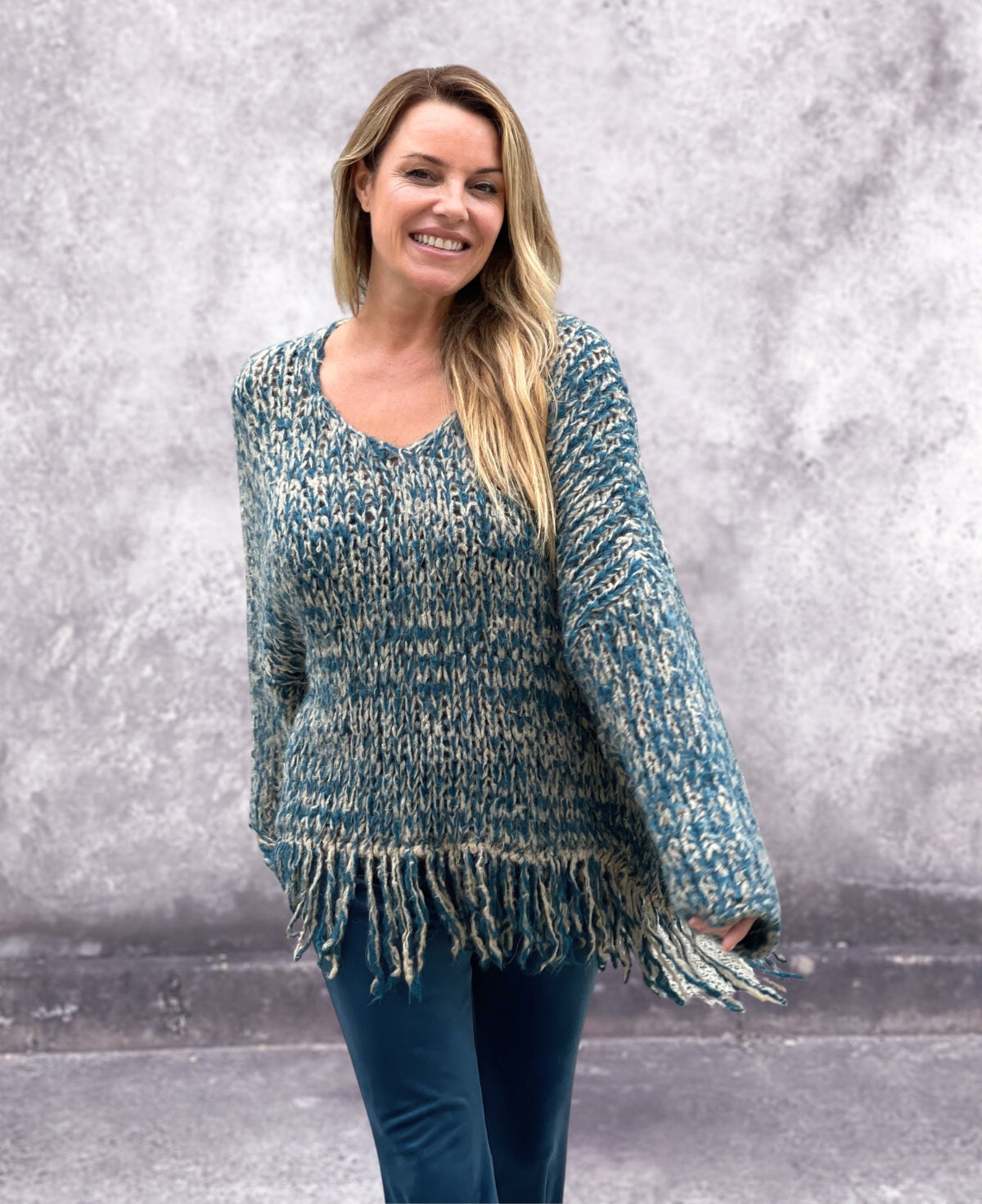 Cozy and stylish Joplin Jumper in jeans blue, crafted from a chunky mohair blend with playful fringing.