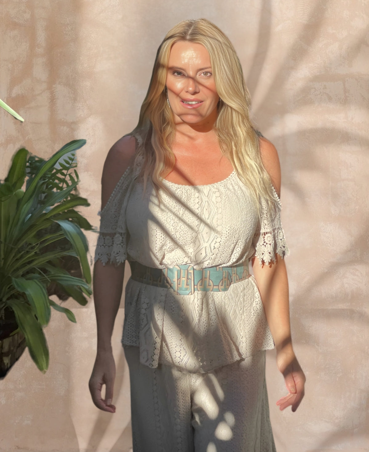 Elegant beige Louella Lace Top with intricate crochet cotton lace and a cold-shoulder design, perfect for a boho-chic look.