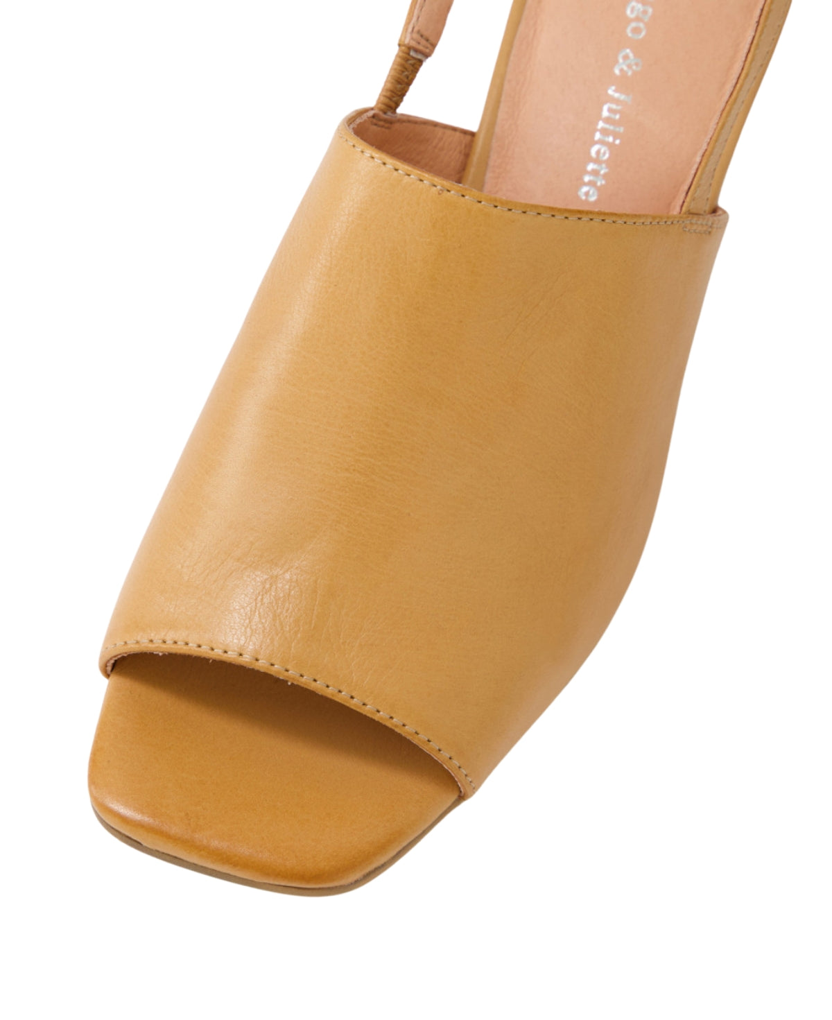 Front-facing view of the PYPER mule, highlighting the open square toe design and elegant leather upper.
