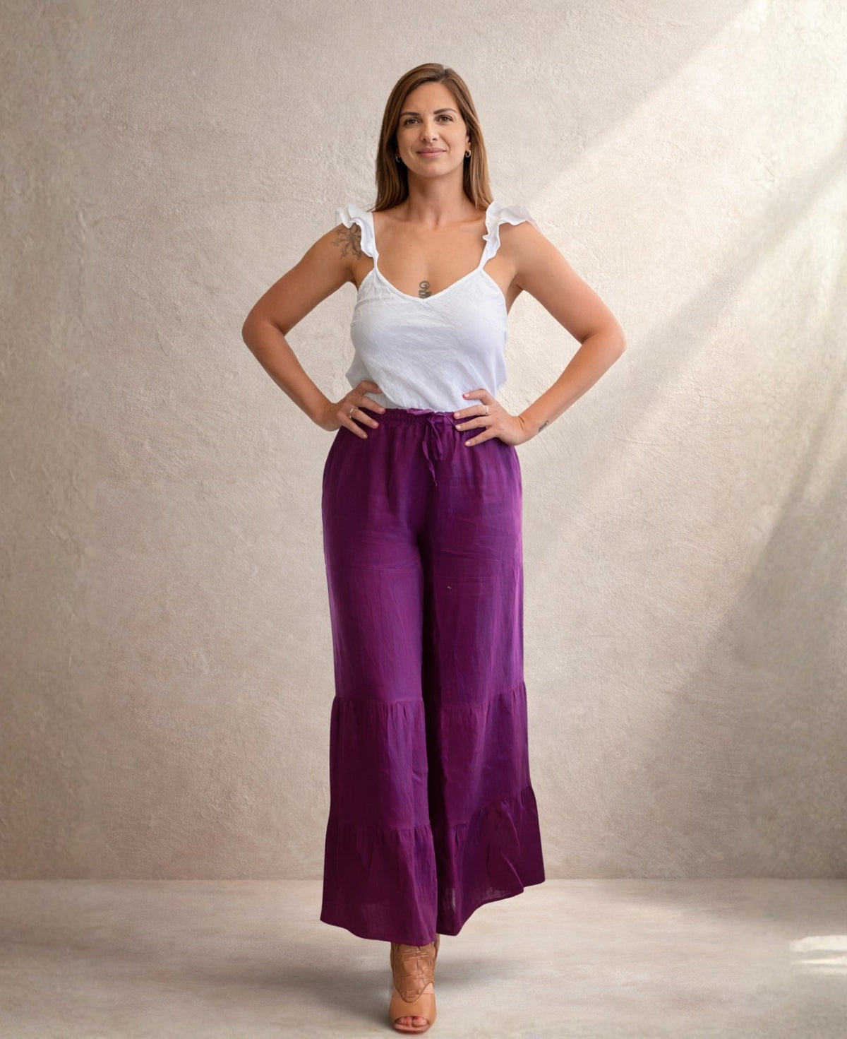 Purple Pauline linen pants with wide leg and layered detailing, breathable boho trousers in 100% linen styled for relaxed summer wear