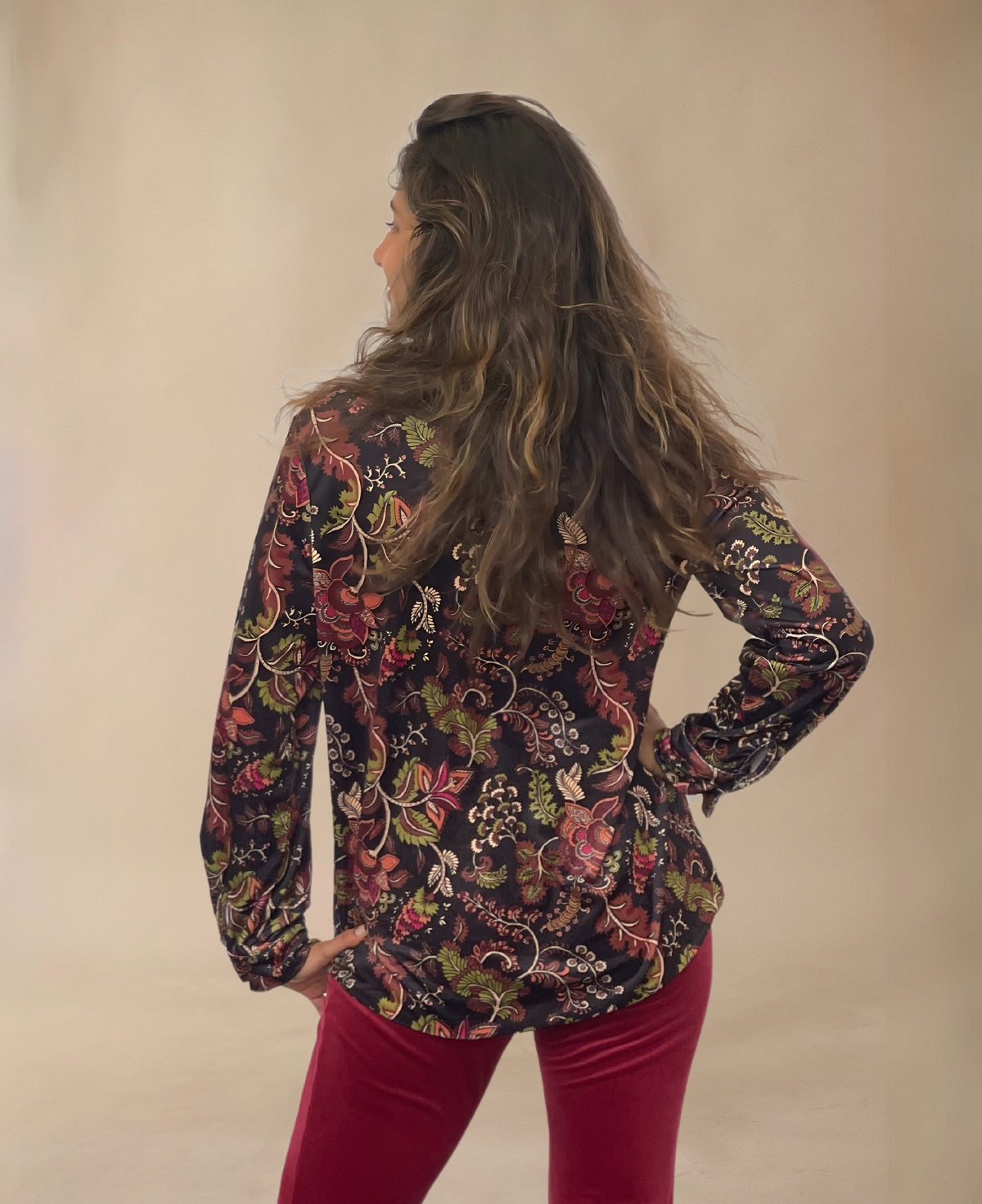 Back view of Ruby Velour Vintage Shirt showcasing rich floral pattern and soft velour texture