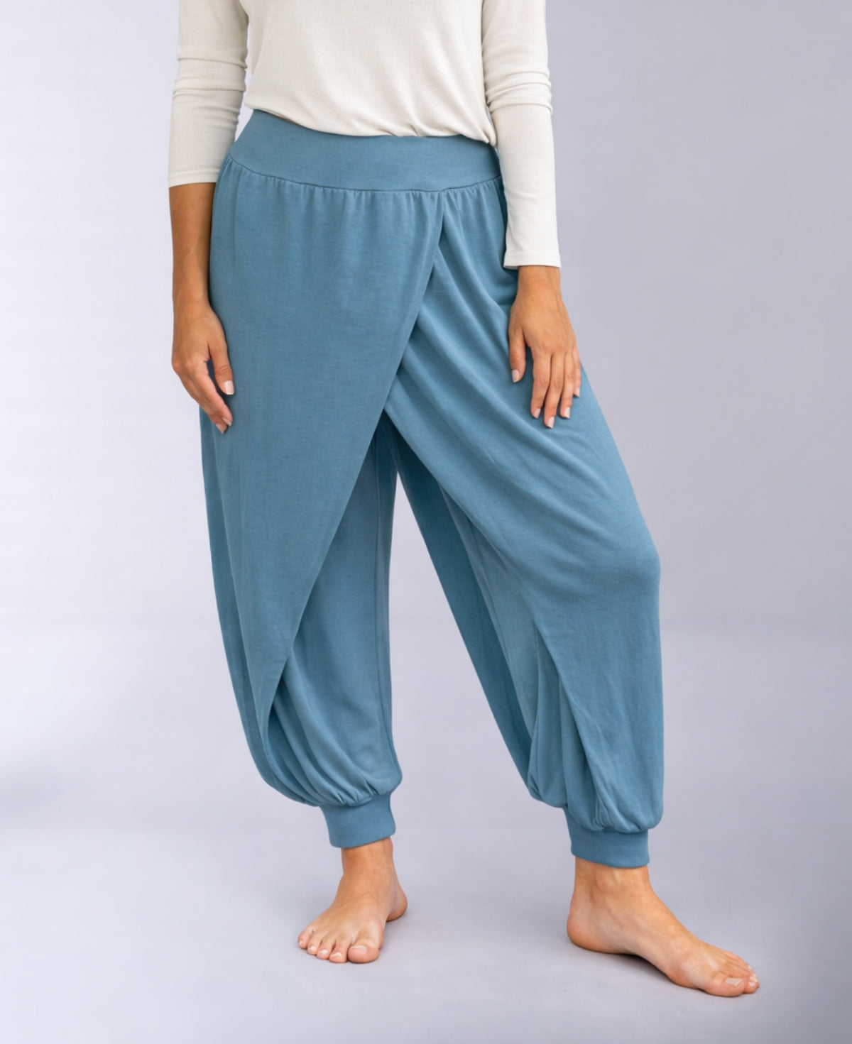 teal aladina knit harem pants showing contrast between outer knit layer and lighter cotton lining in relaxed fit