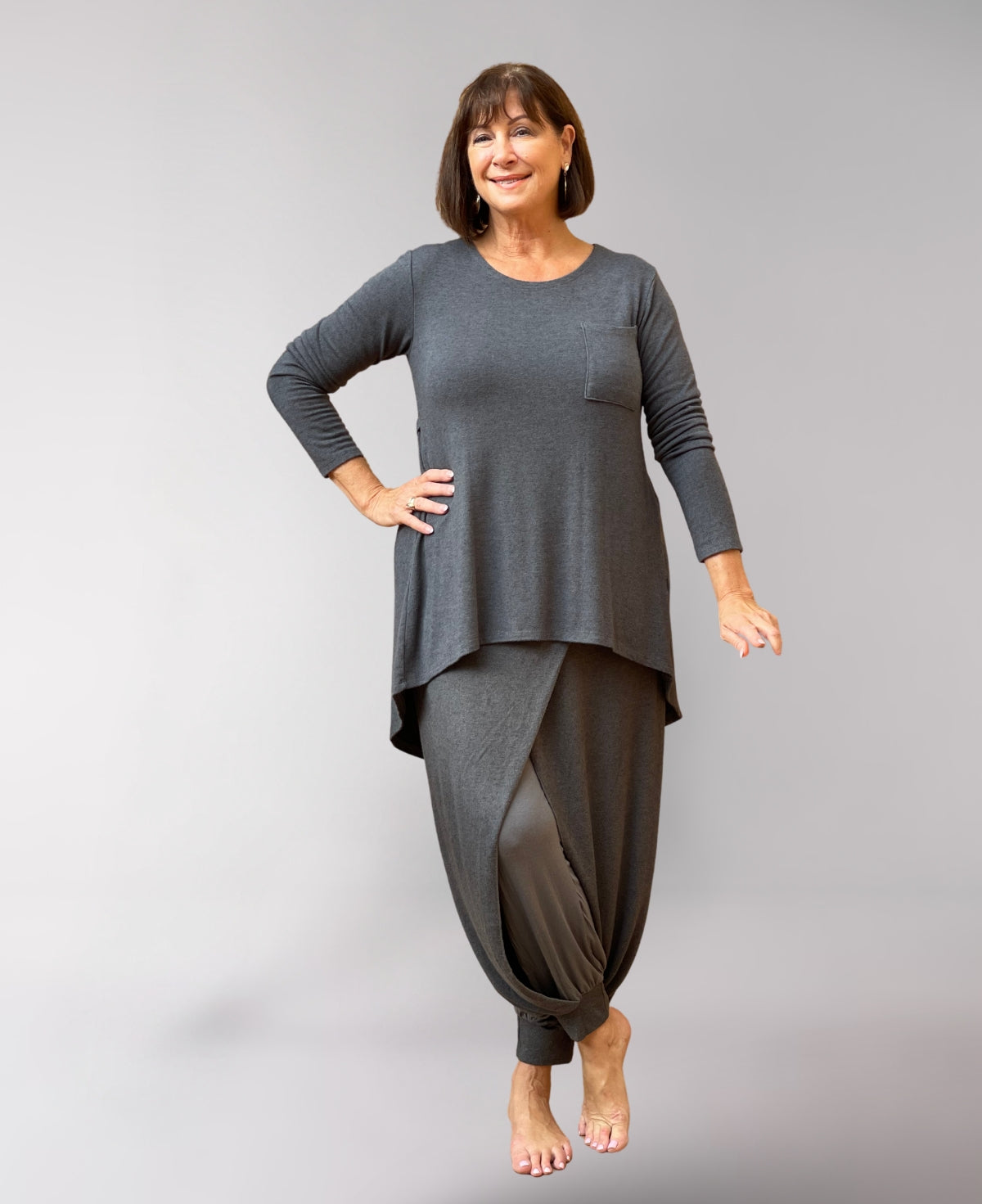 Front view of charcoal Aladina Knit Harem Pants showcasing a relaxed pull-on design, ribbed waist, and breathable rayon lining for active comfort