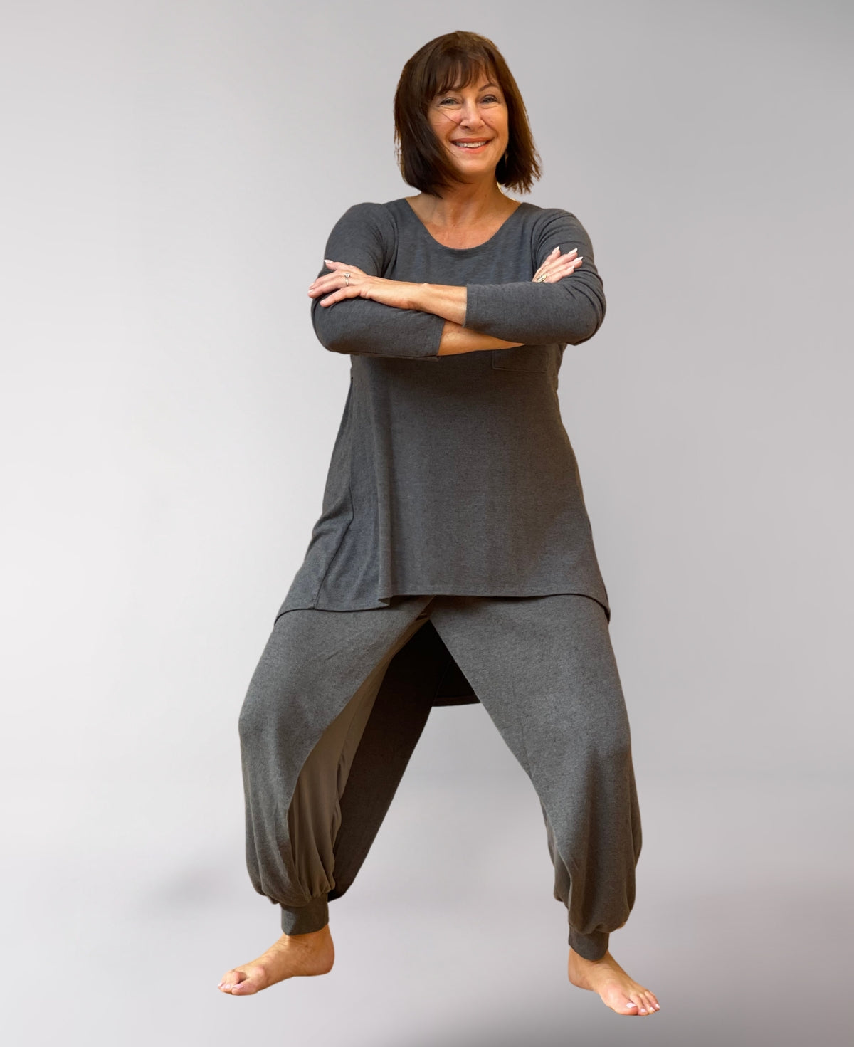Charcoal Aladina Knit Harem Pants offering a laid-back, boho-inspired look with a ribbed waist and lightweight knit fabric.
