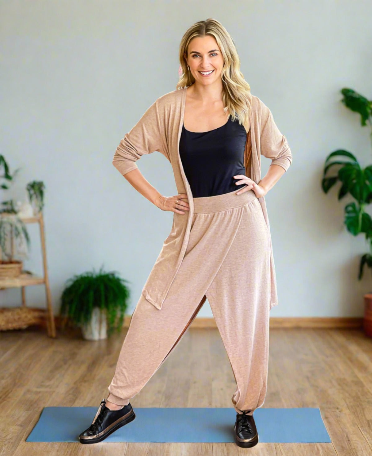 Front view of light camel Aladina Knit Harem Pants featuring a casual knit-woven design, cozy ribbed waist, and soft rayon lining for a laid-back yoga look