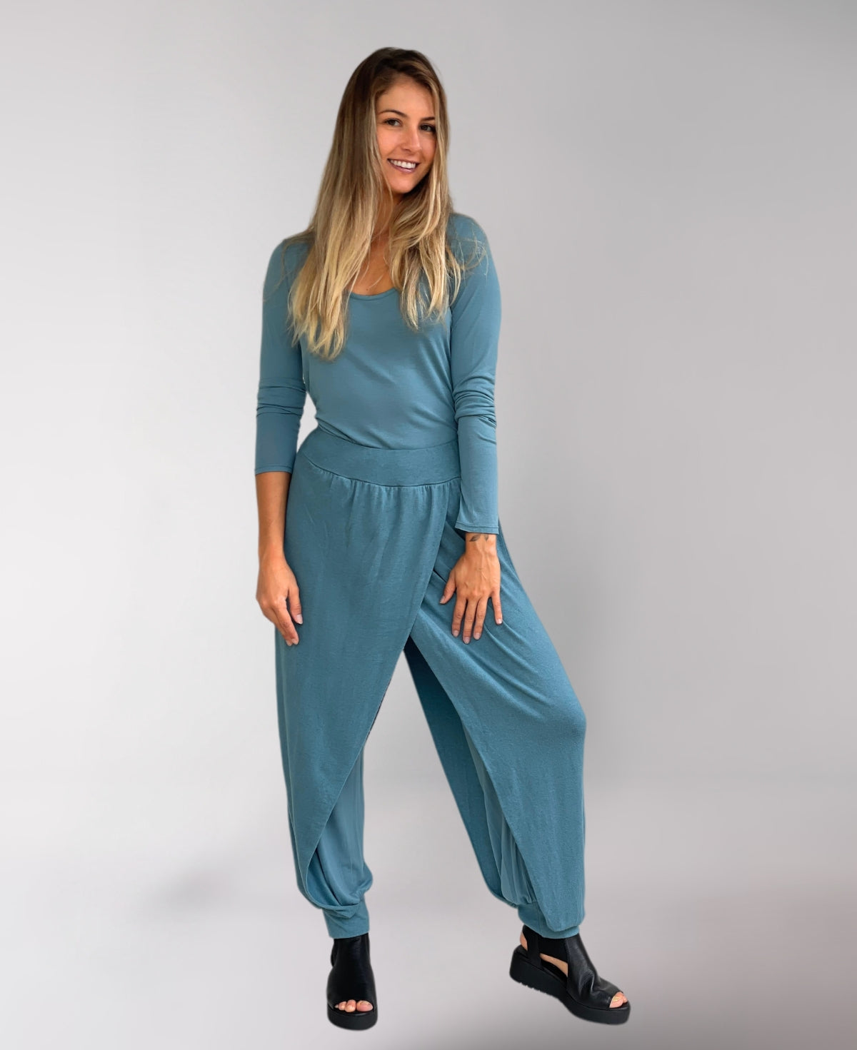 Teal Aladina Knit Harem Pants in a relaxed fit, featuring a soft stretch waistband and breathable rayon lining for effortless movement.