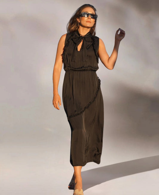 Elegant black satin dress featuring a ribbon collar, crossover back, elastic waistband, and asymmetrical frill skirt. A sophisticated and versatile piece for effortless style.