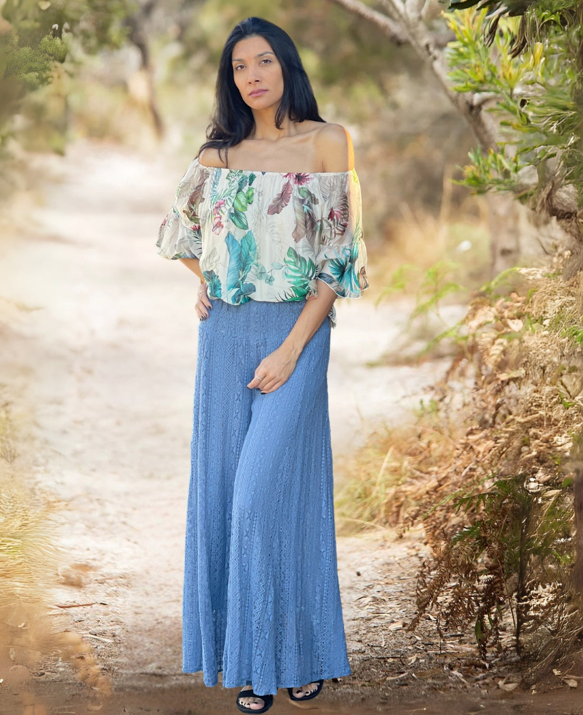 Blue-Heaven boho wide leg pants featuring exquisite cotton lace textile with a fine stretch lining, extra-wide flare, and a flattering shirring waistband.