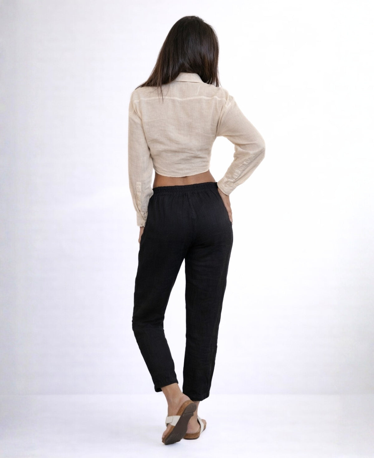 Back view of black Brooklyn linen pants showing elastic waistband and clean back silhouette, lightweight linen pants photographed in studio