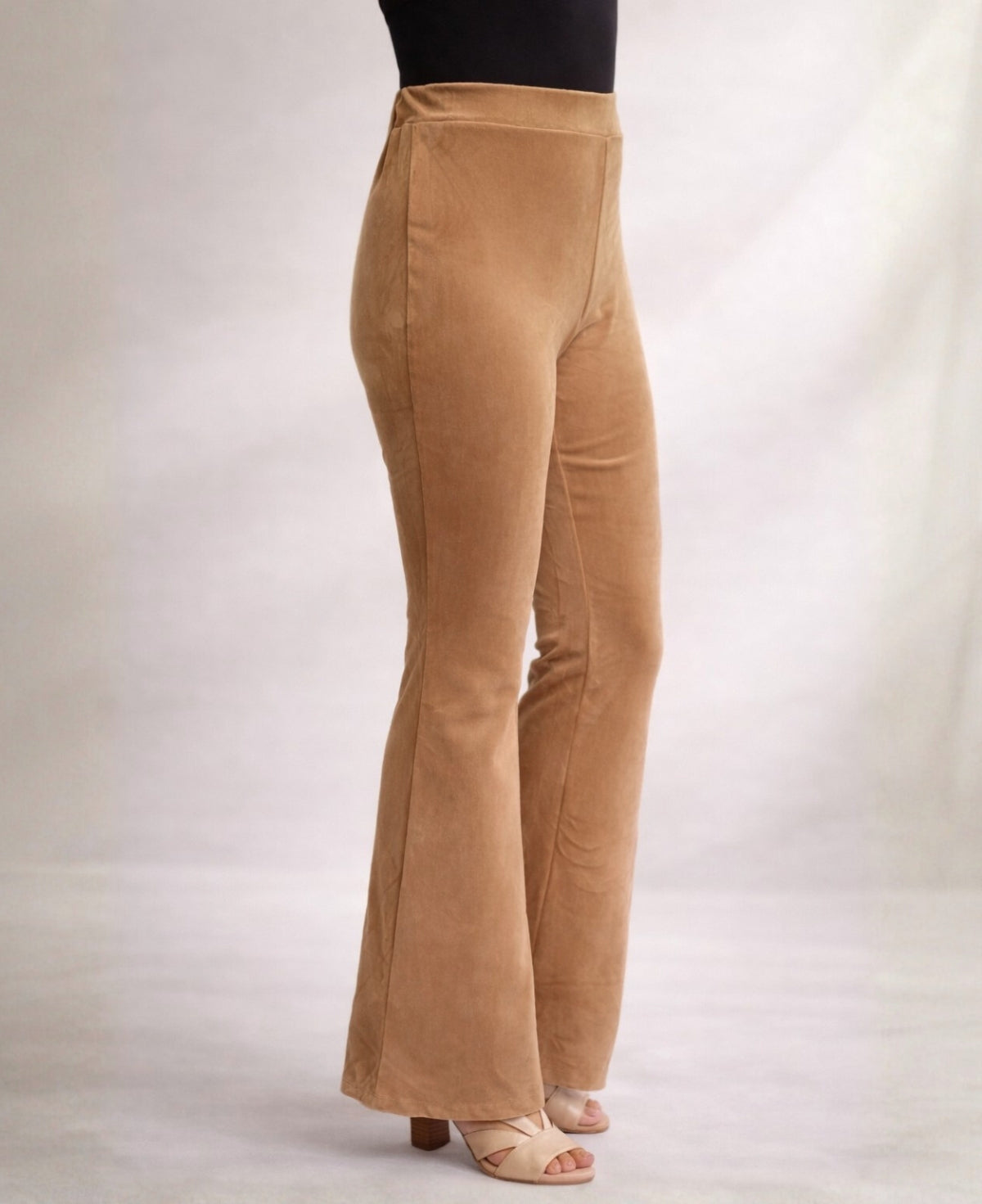 Close-up side view of Camel Marshmallow Velour flare pants highlighting the velour fabric, high waist and gentle flare