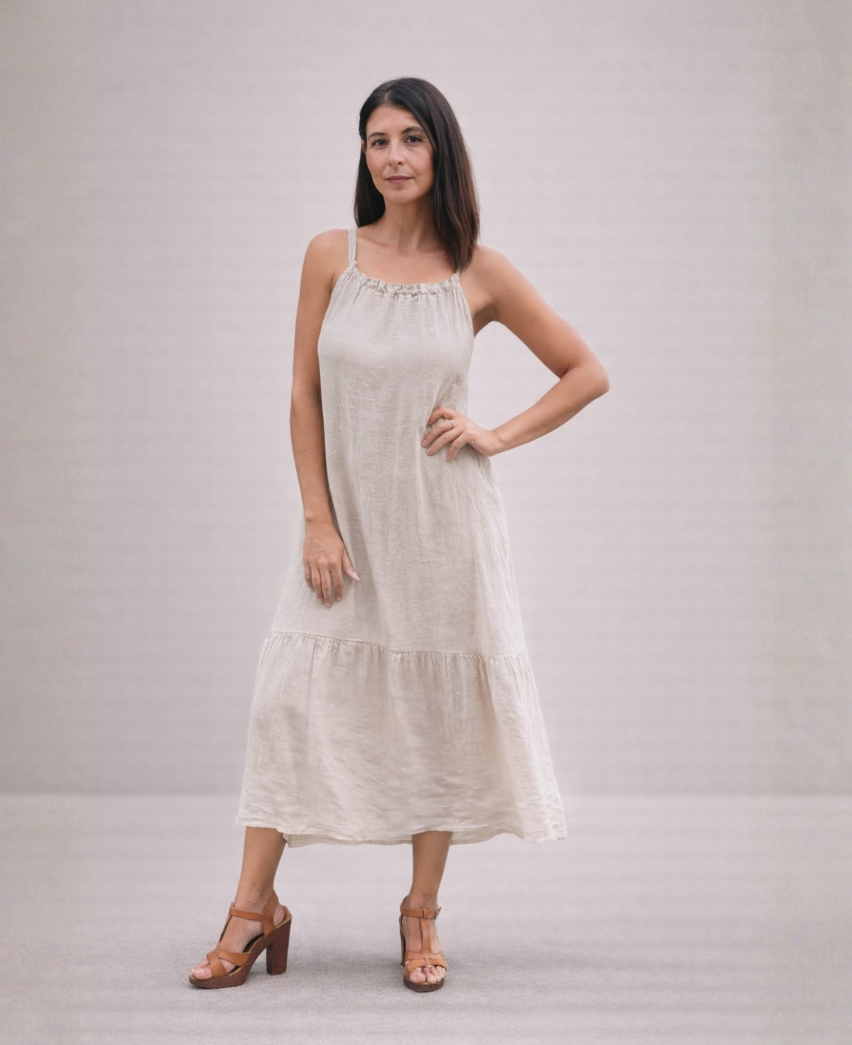 Front view of the Cassey linen dress in beige, highlighting relaxed fit, gathered neckline and breathable linen texture.