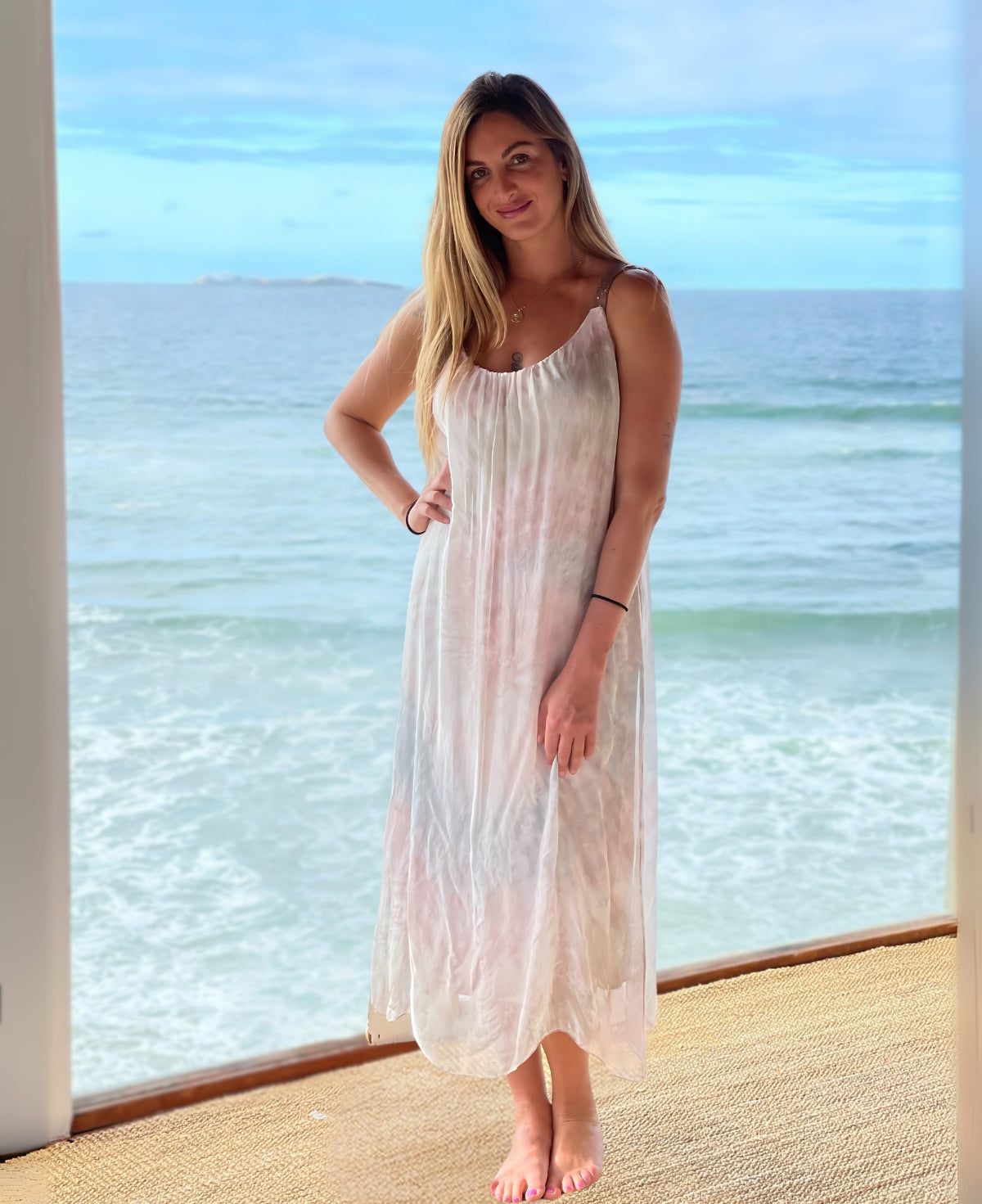 Delicate rose tie-dye silk blend maxi dress with shimmering sequin-embellished shoulder straps, perfect for summer weddings or special occasions.