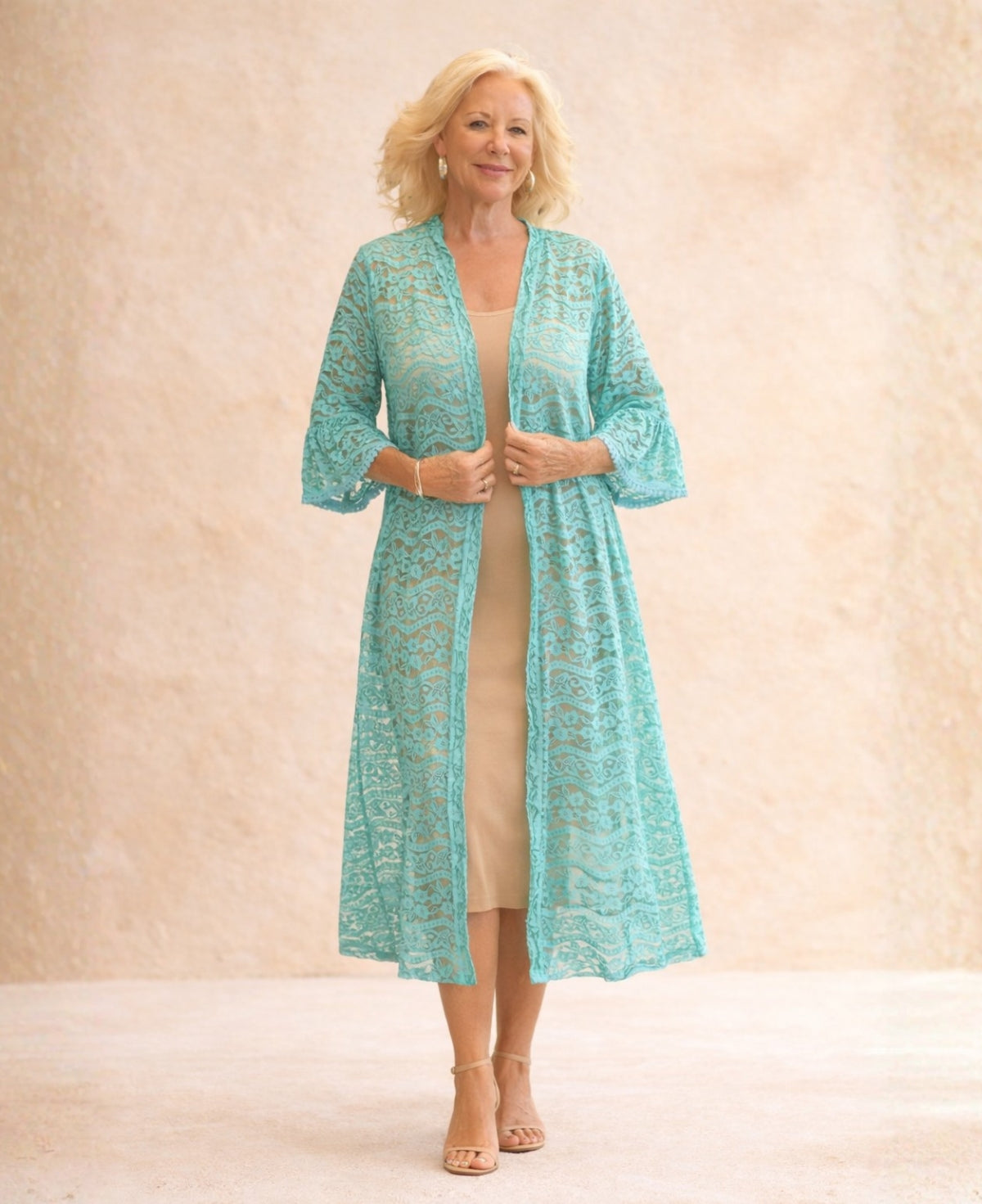 Front view of the Daniella Lace Kimono in Tiffany highlighting the open-front design, 3/4 fluted sleeves and semi-sheer cotton lace texture.