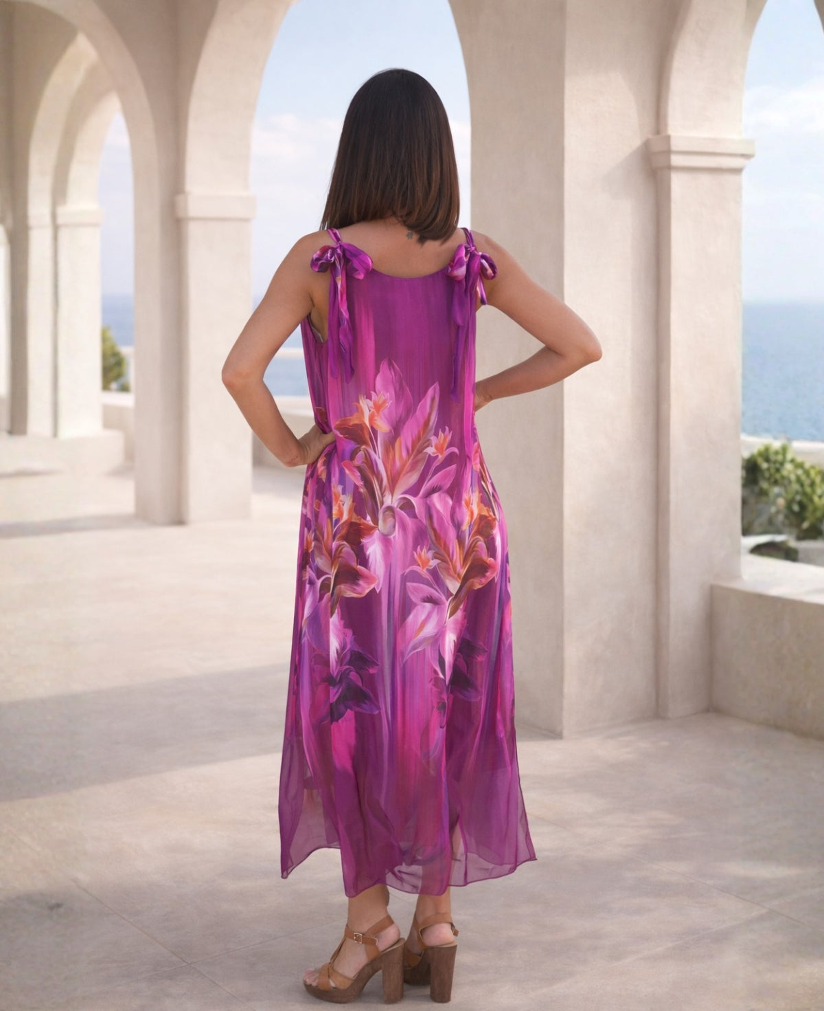 Back view of Dior Silk Dress in sangria colour floral silk, featuring sheer tie straps and fluid midi silhouette