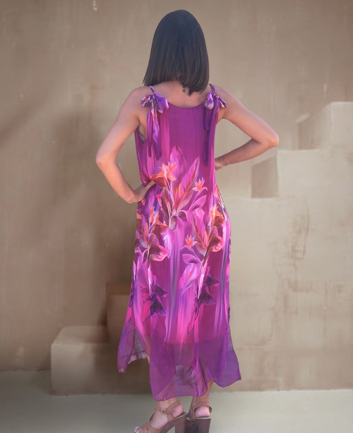 Back view of the vibrant sangria Dior Silk Dress, highlighting the refined design details and lightweight rayon lining for ultimate sophistication.