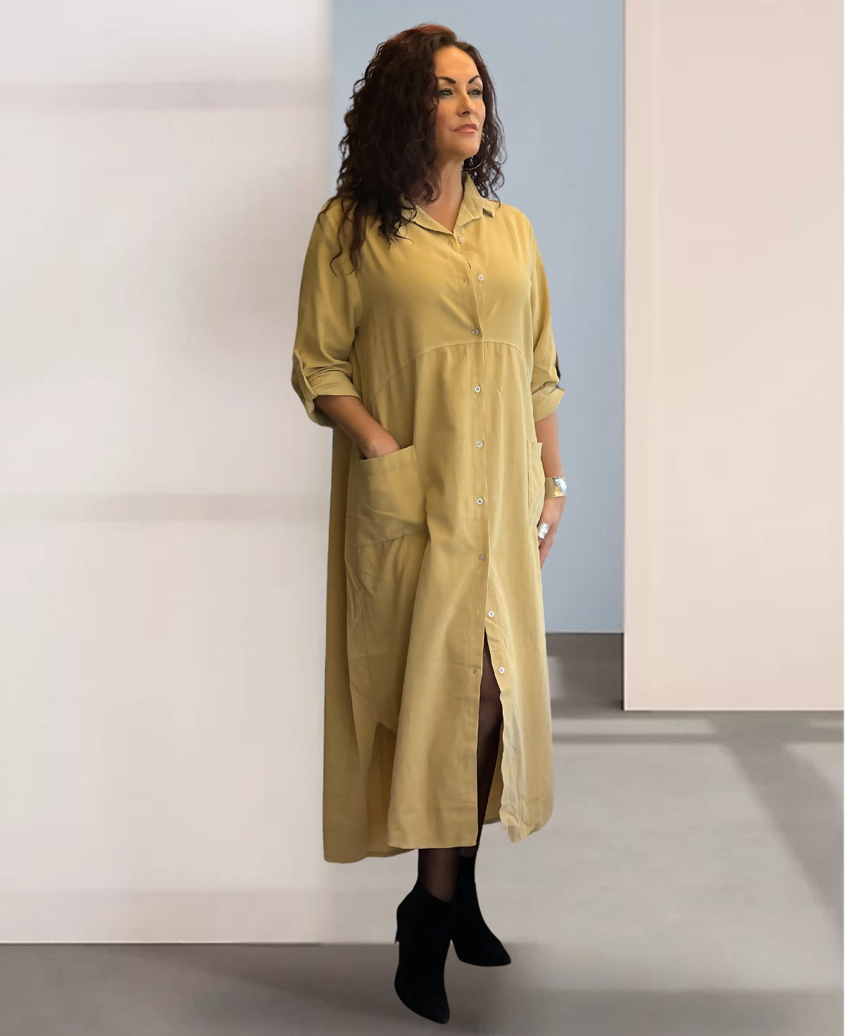Versatile Light Camel corduroy maxi shirt dress, effortlessly transitioning from dress to duster for multi-season wear.