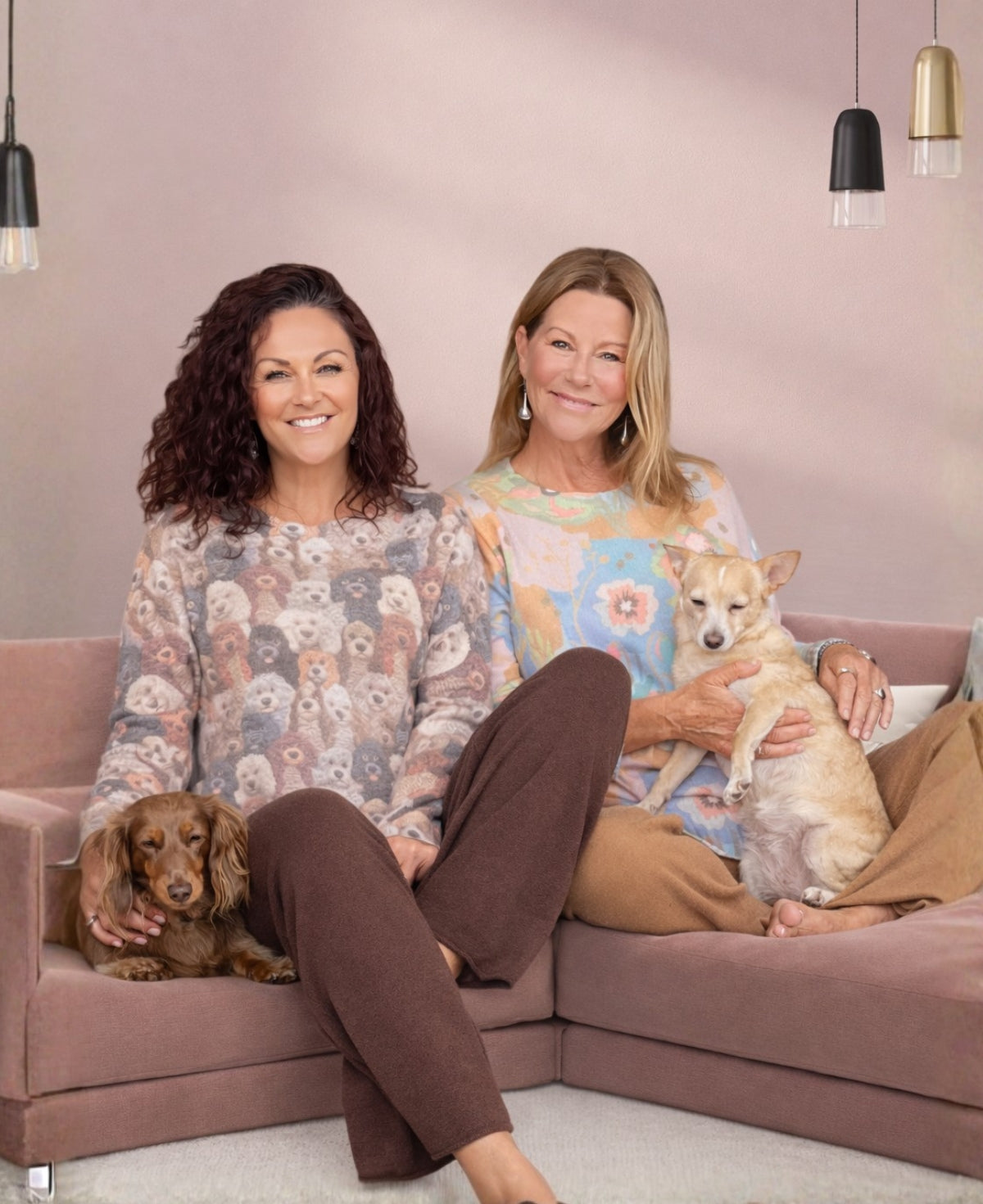 Dog print cashmere sweater worn in seated lifestyle setting