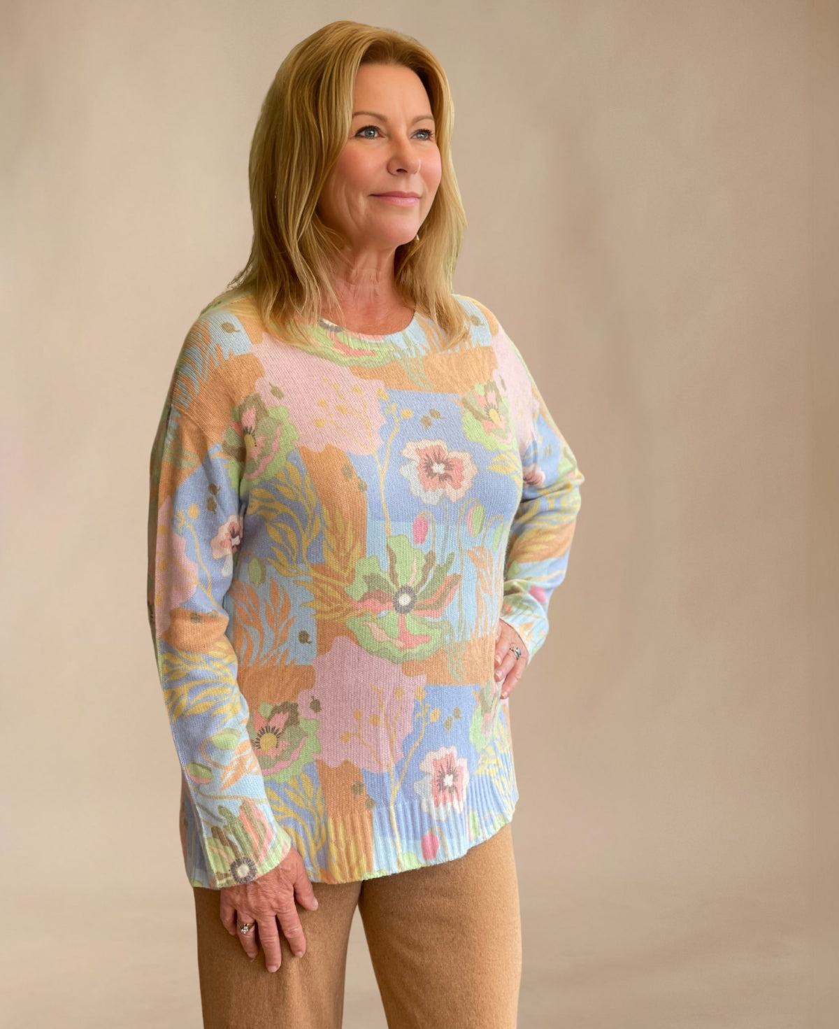 Front view of Genoa Cashmere Sweater in Pastel Flor print, featuring a vibrant yet soft pastel floral design on cozy cashmere blend fabric.