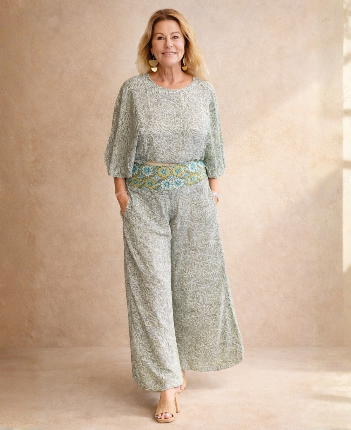 Front view of the Iris Silk Set in sage green Indian silk blend featuring wide leg pants, relaxed top and 3D embroidered waistband for women.