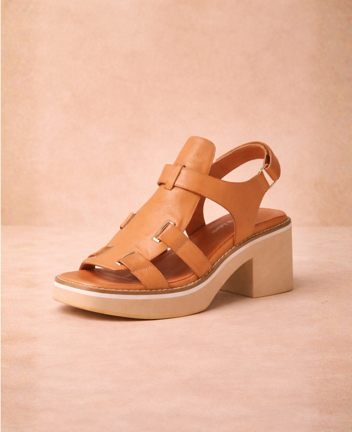 Jennis tan leather sandals with square toe and block heel shown from the front three-quarter angle