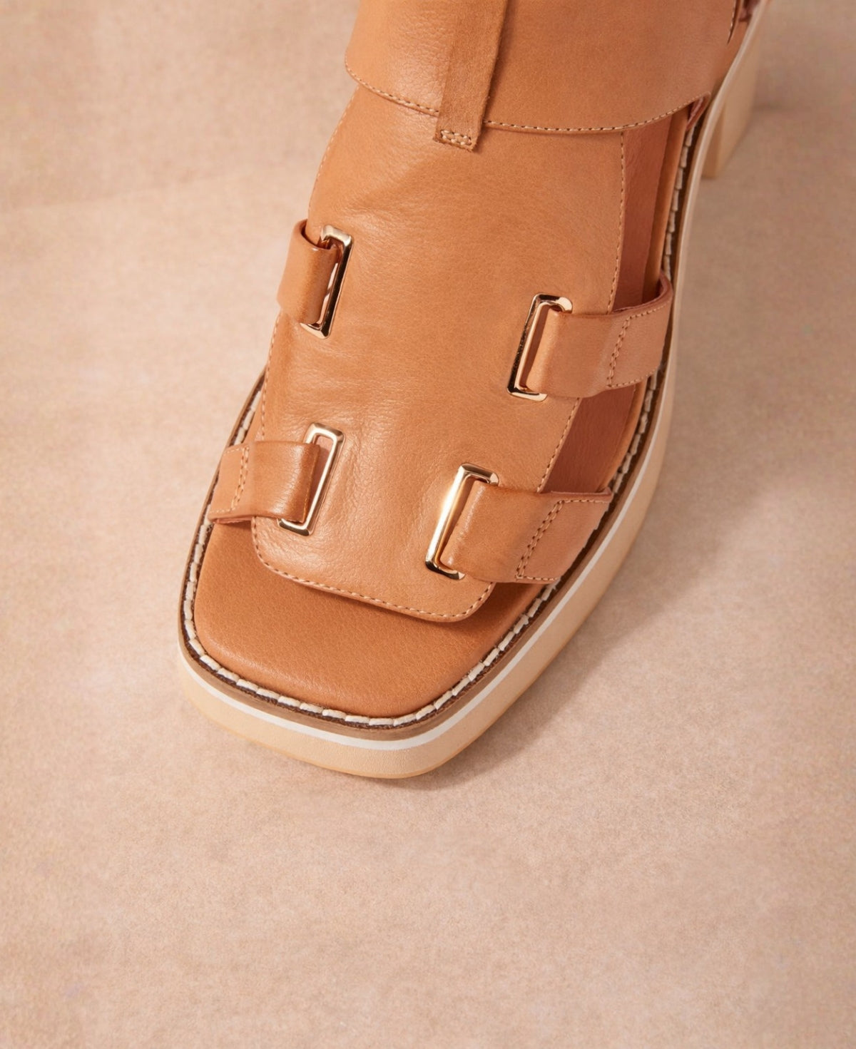 Close-up of Jennis tan leather sandals showing square toe, leather straps and gold-tone hardware