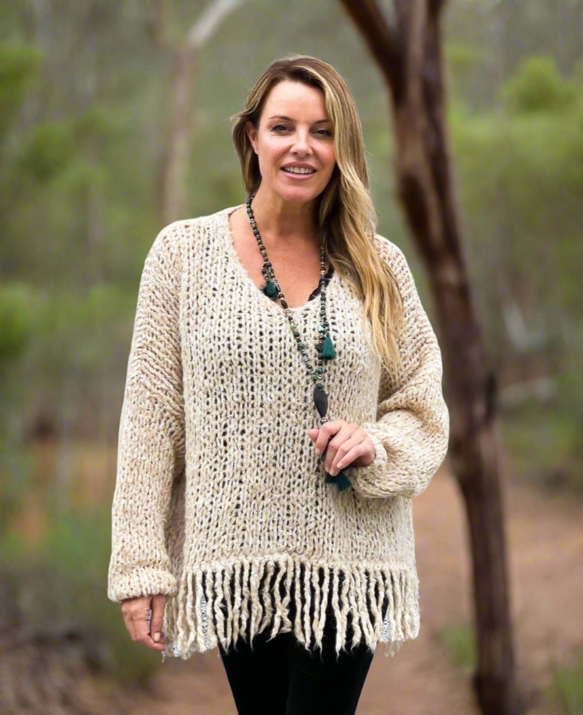 Joplin Wool Blend Jumper in beige, designed with a soft mohair blend, V-neckline, and bohemian fringe hem