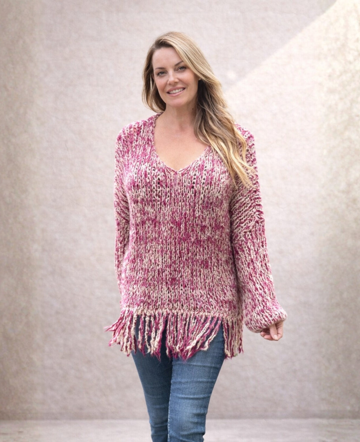 Sangria Joplin Wool Blend Jumper, a vibrant chunky-knit sweater with a relaxed silhouette and stylish fringe detail. 