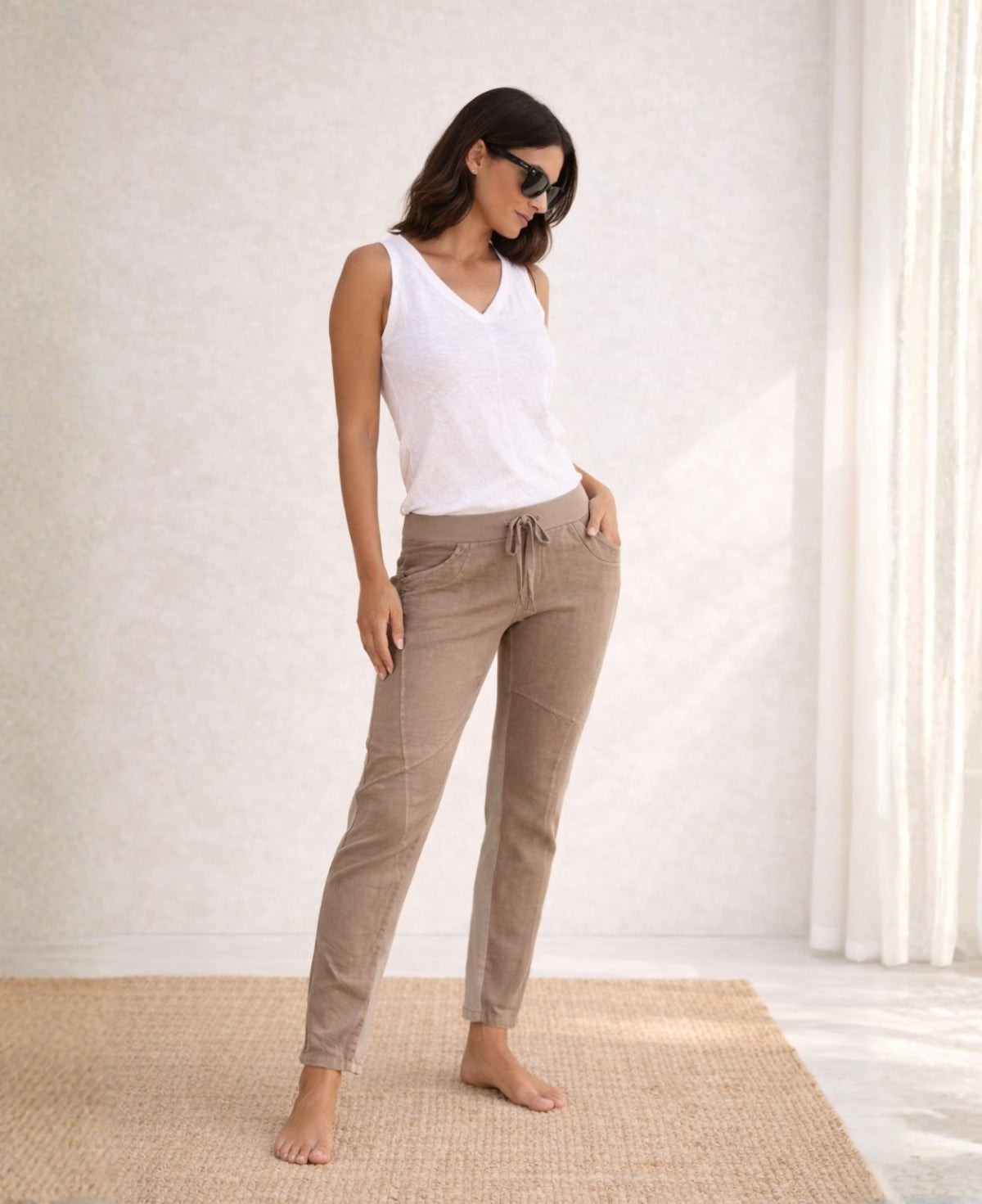 Full body front view of the Jordan Linen Pants in camel with front seam detailing and ribbed cotton stretch waist.