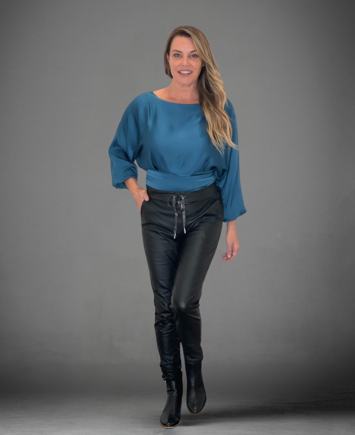 Classic black Leatherette Vegan Pants, designed for a sleek, modern silhouette.