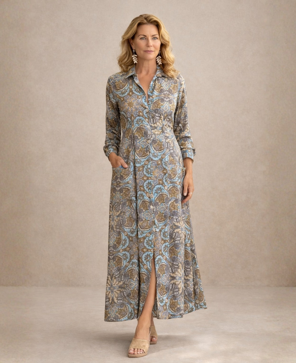 Front studio view of the Lilly Indian silk shirt dress, one size AU 8–12, featuring tailored waist, functional button front to knee length, long sleeves with cuffs and front patch pockets.