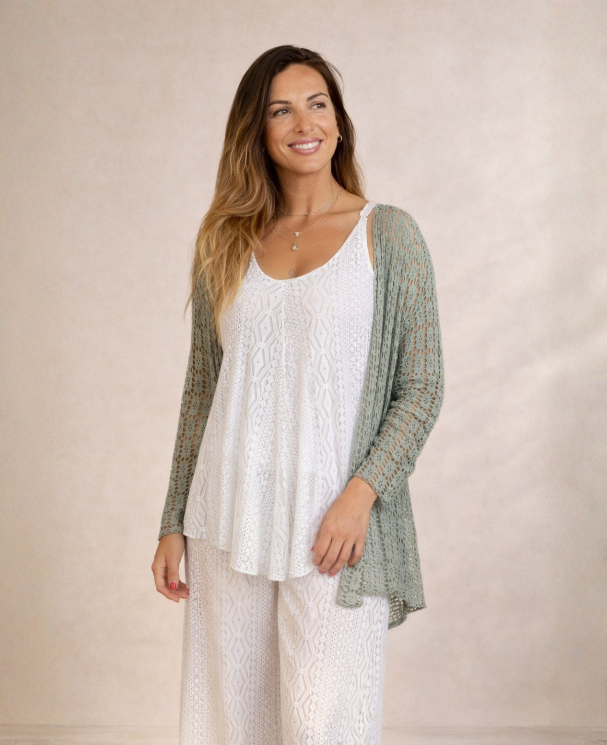 Three quarter view of Louella Lace Cardi in Khaki showing lightweight stretch lace and longer hemline.