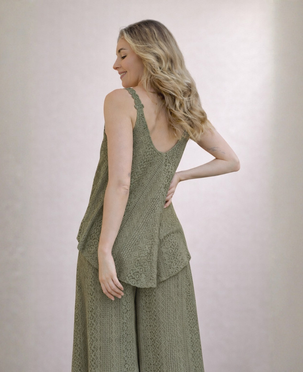 Back view of Louella lace swing top and wide leg pants in Khaki green showing soft drape and scalloped strap detail.