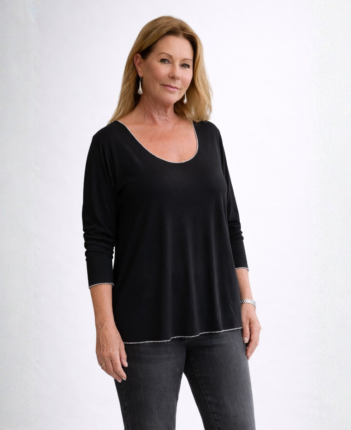 Black Maree long sleeve top in lightweight viscose jersey shown in angled front view with straight hem and relaxed fit