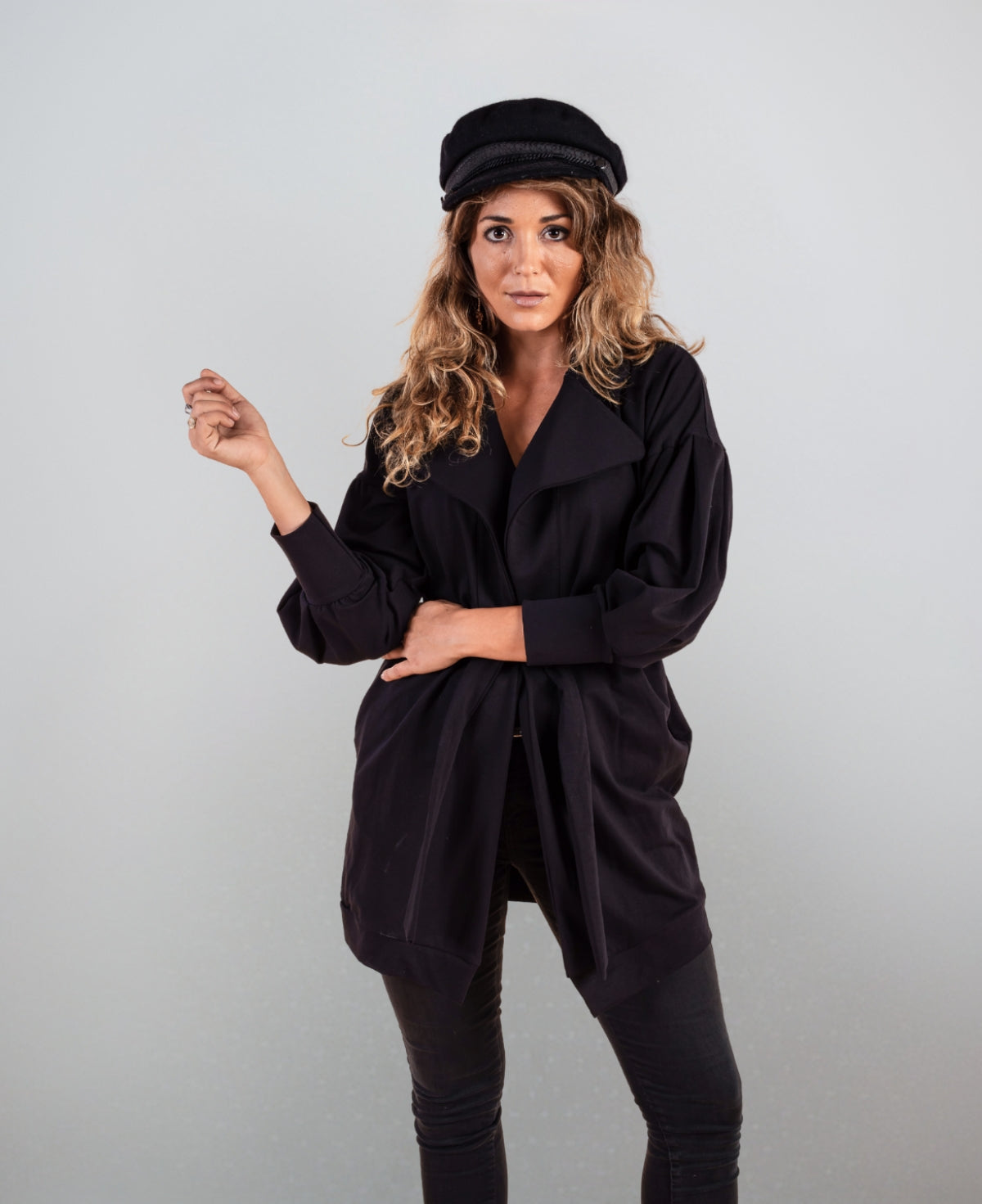 Classic black Milano Sweater Belted Coat, featuring a tailored fit with a stylish sash belt.
