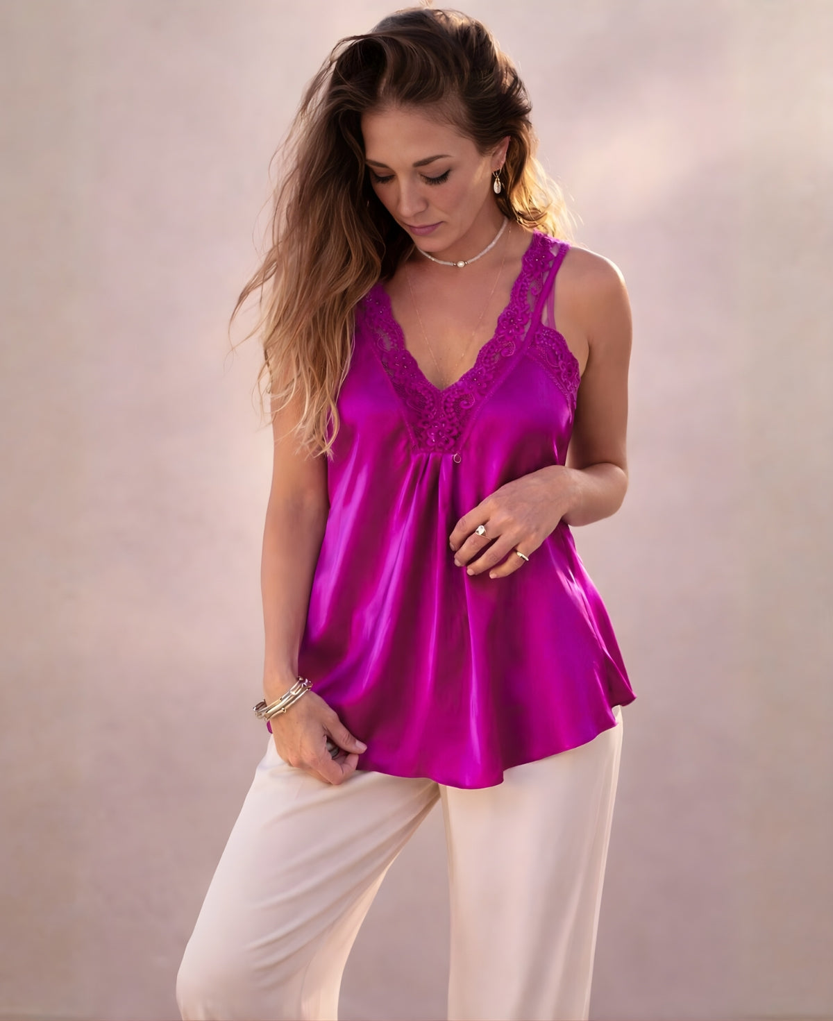 Close-up studio portrait of the Moulin Lace Satin Cami in Sangria featuring the lace V-neckline and luminous satin texture.