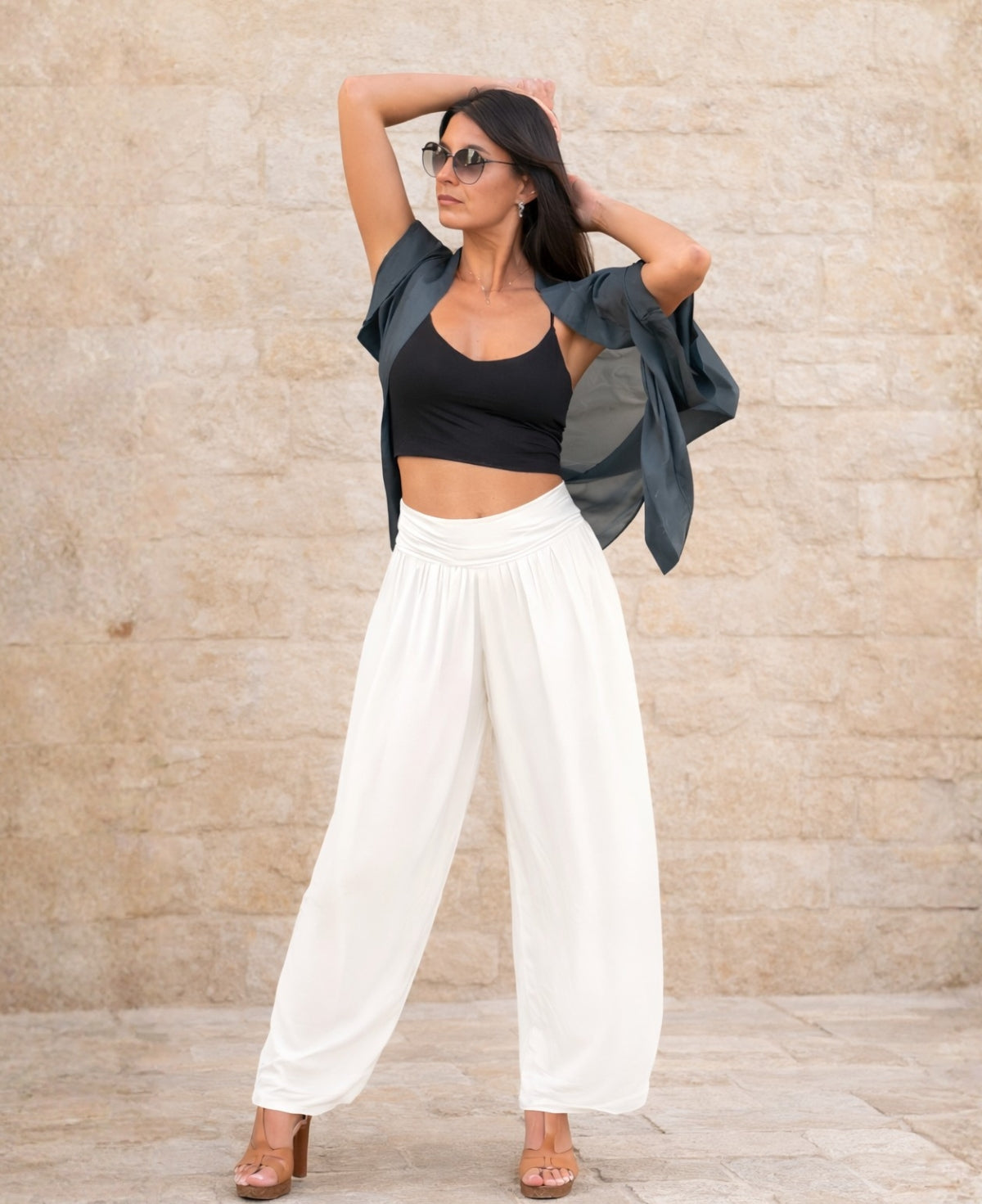 Styled front view of Petra silk blend balloon pants in white showing lightweight sheer texture, relaxed fit and flowing movement