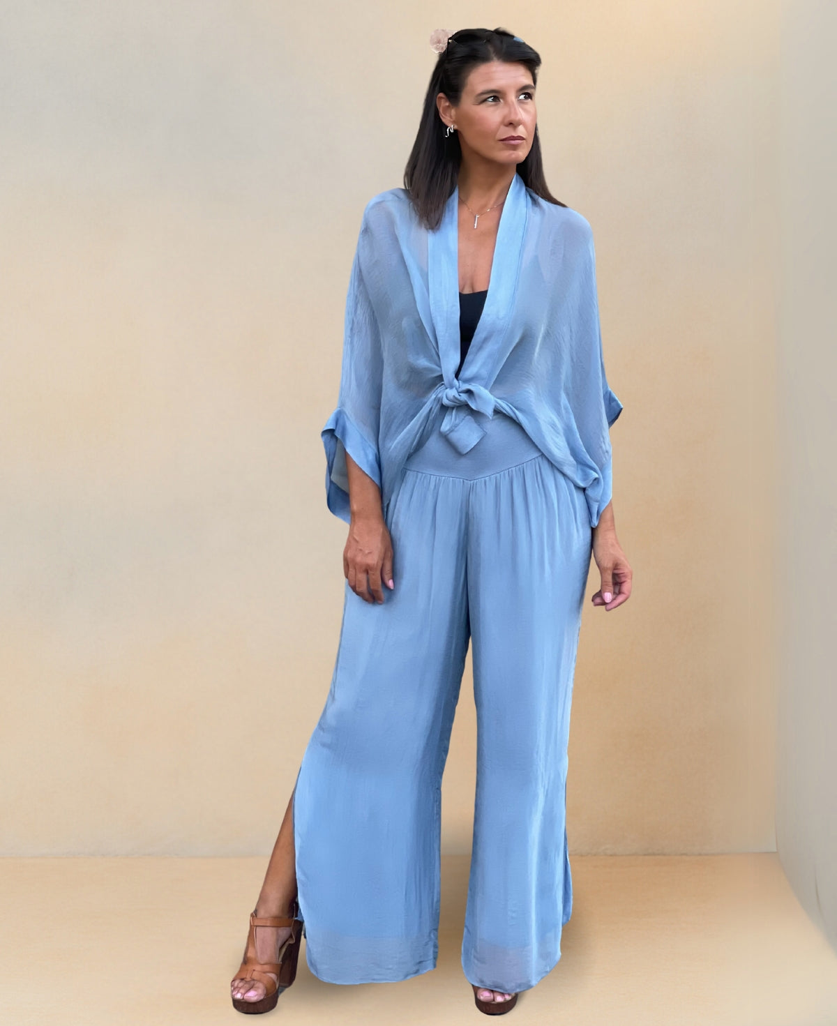 Full frontal view of Silk-Blend Pants showcasing calf-high slit and elegant silhouette