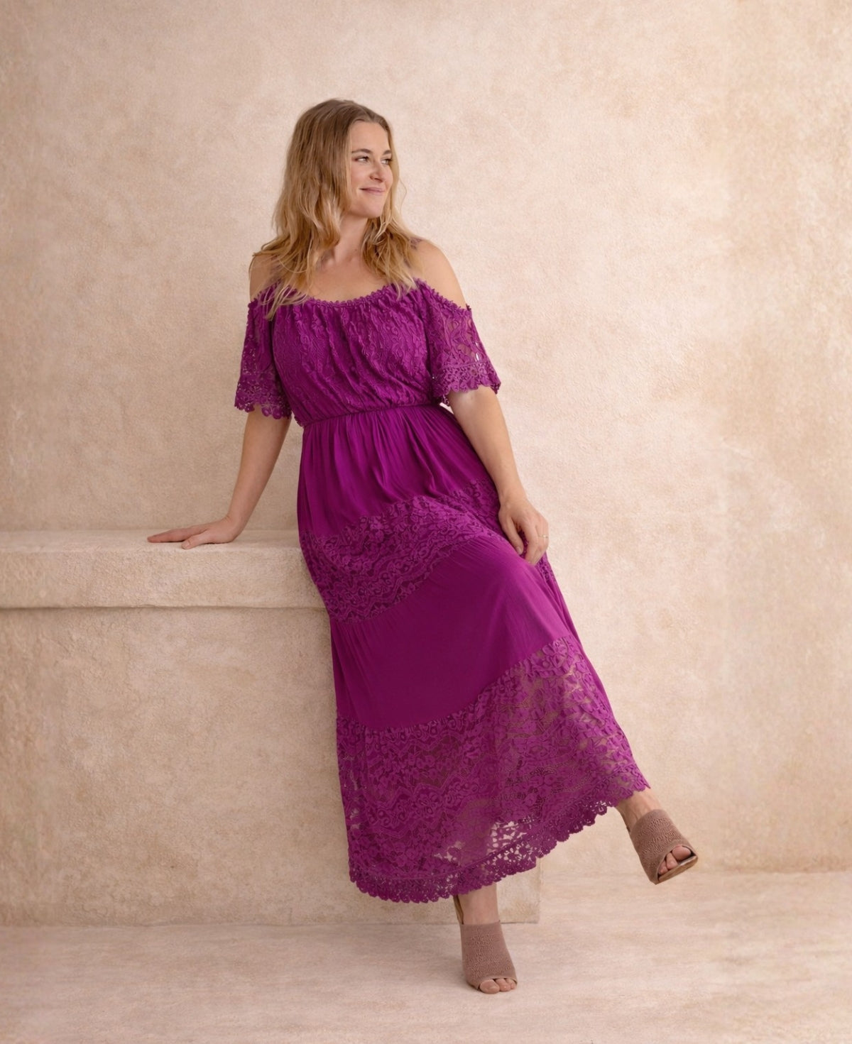 River Silk & Lace Dress sangria variant seated pose showing silk panel drape and lace texture.