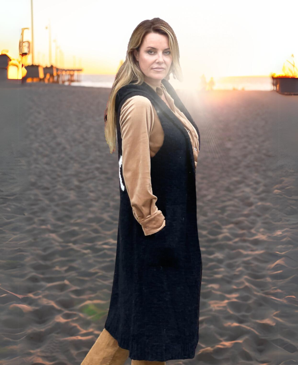Side view of Black Rockstar Jumper showing long, knitted sleeveless cardigan style