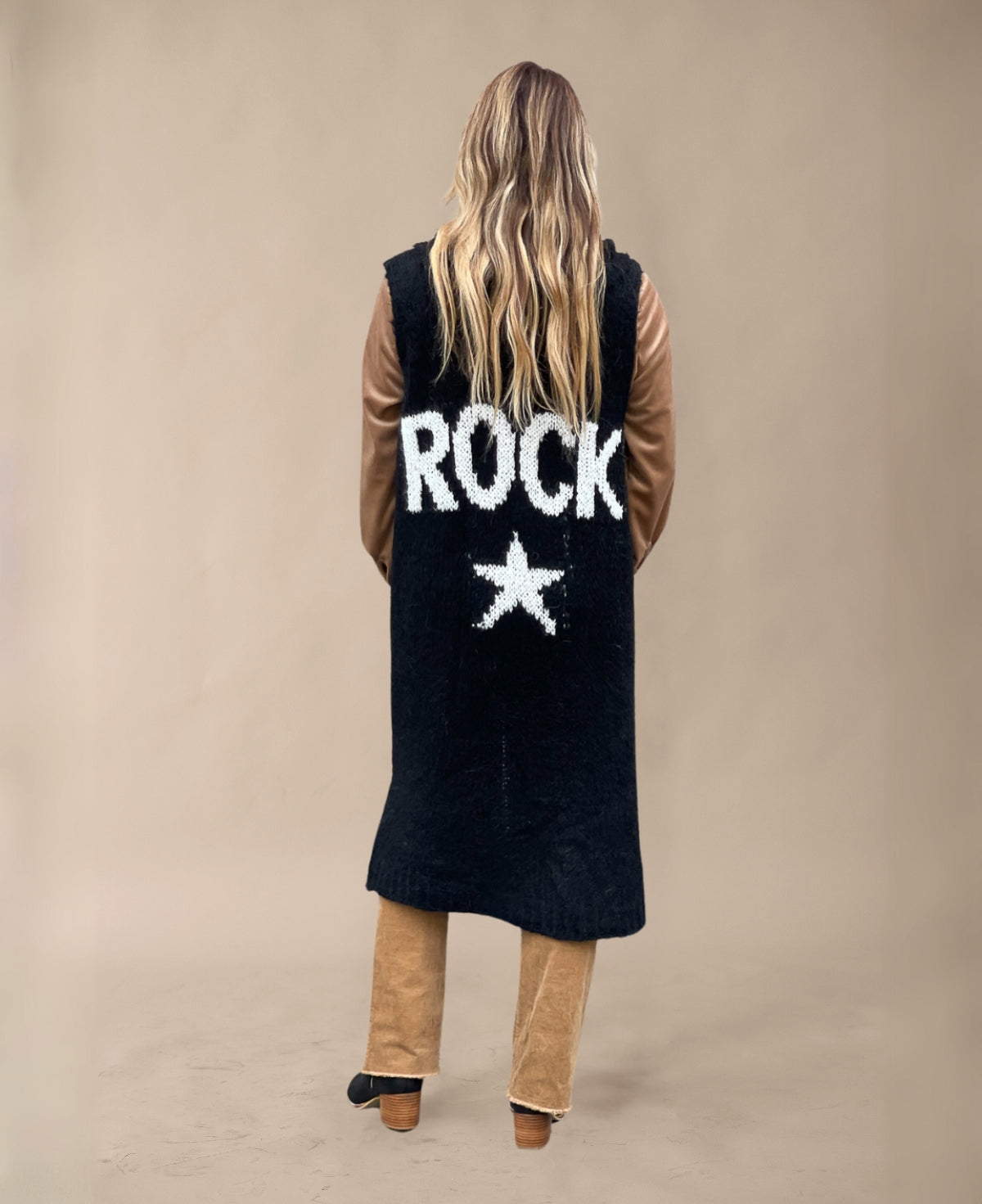 Back view of Black Rockstar Jumper with "ROCK" graphic and hooded feature
