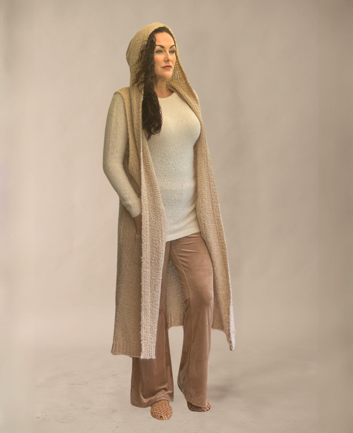 Front view of Camel Rockstar Jumper showcasing knitted, long sleeveless cardigan design