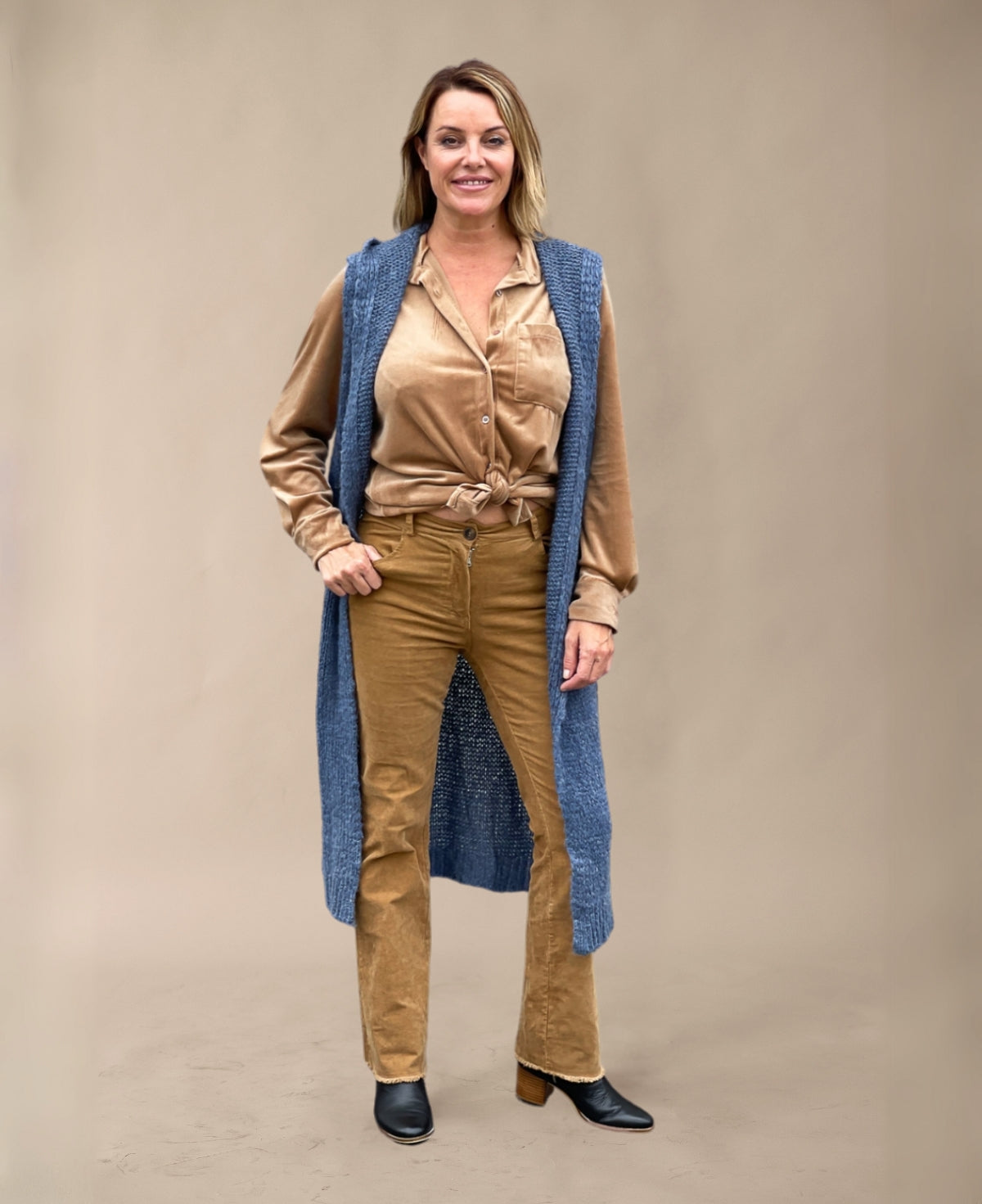 Front view of Jeans Rockstar Jumper emphasizing knitted, sleeveless cardigan design