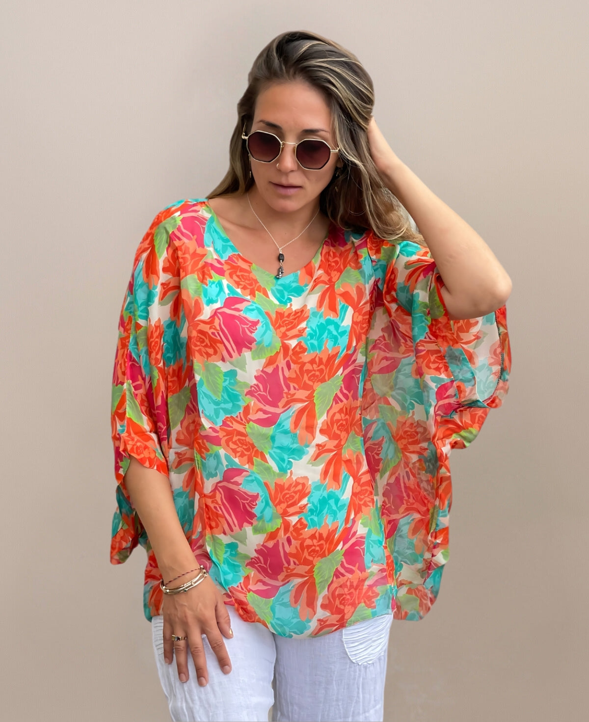 Full frontal view of Roses Silk Top with loose, flowing cut and batwing sleeves