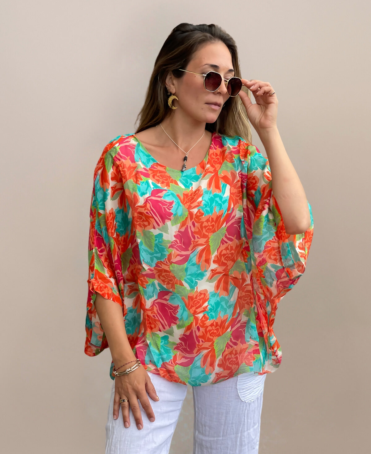 Full frontal view of Roses Silk Top with flowing, flattering silhouette and vibrant summer print