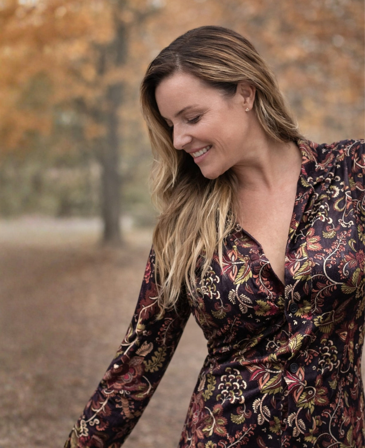 Close-up detail of the Ruby Velour Vintage Shirt Dress showing the vintage print velour fabric and soft texture.