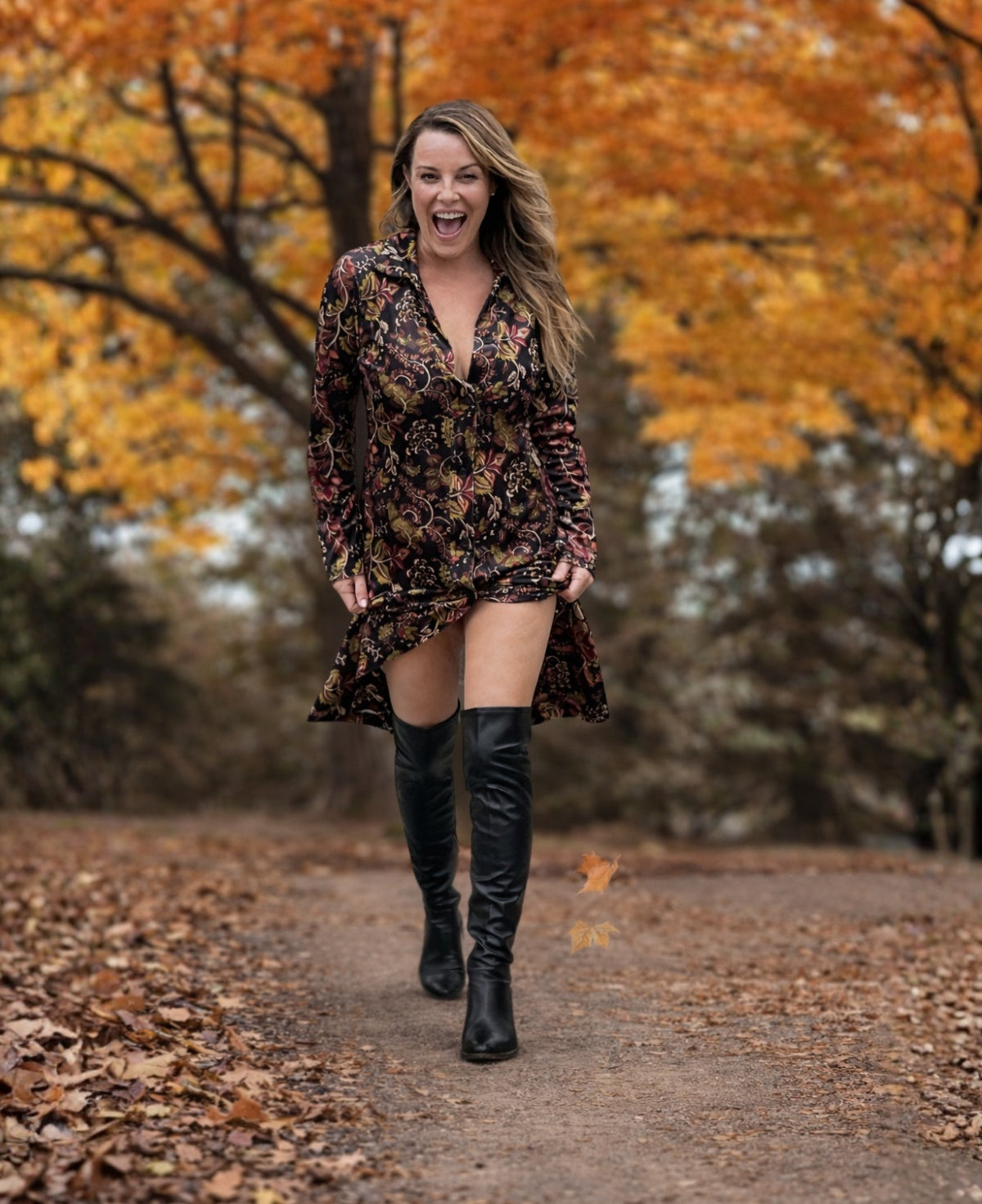 Model walking in the Ruby Velour Vintage Shirt Dress in vintage print velour fabric, showing movement and midi length styling with boots.